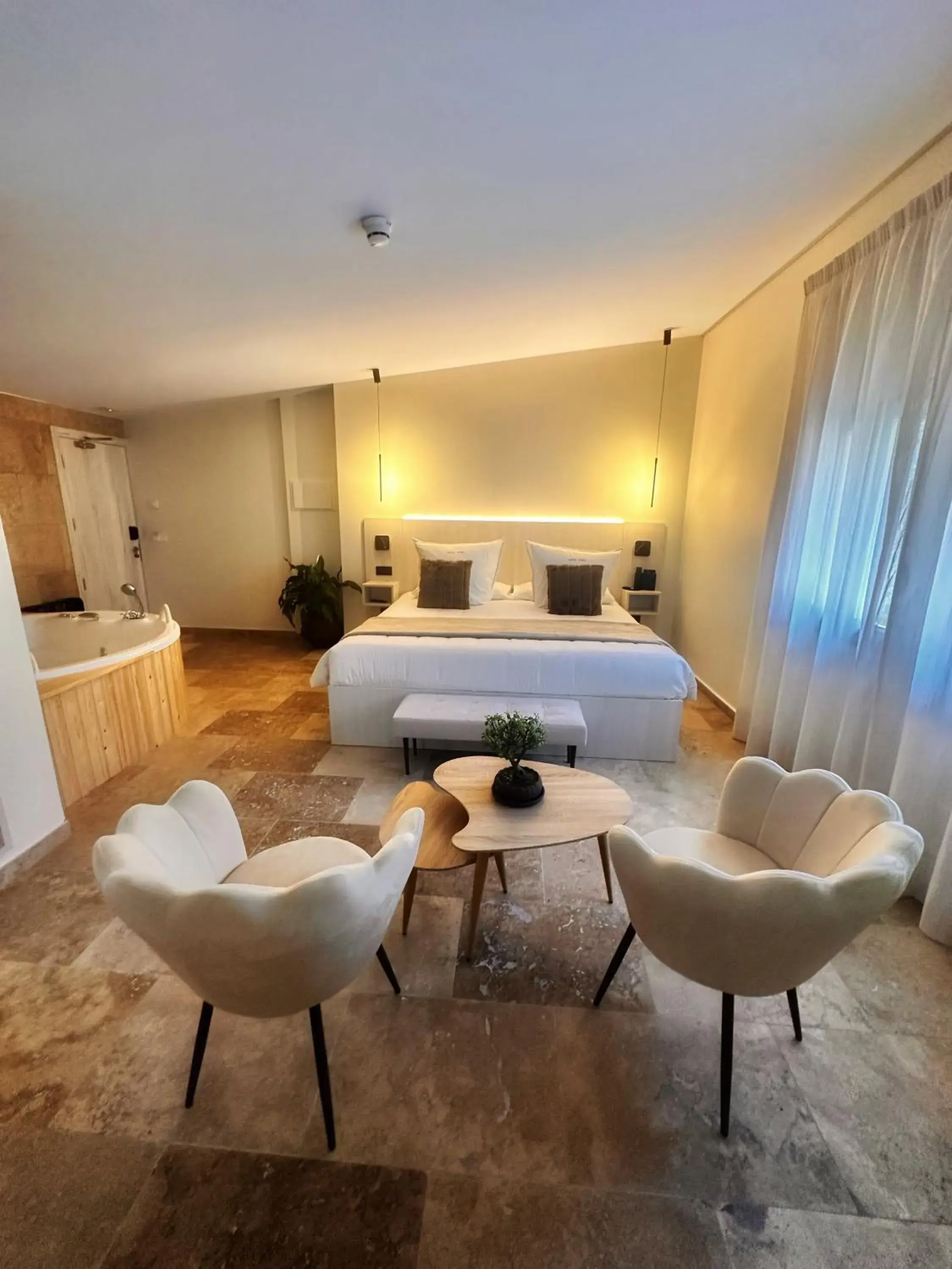 Junior Suite Triple (3 adults) with Jacuzzi Breakfast included in Boutique Hotel Comtal Empuries Junior Suite Triple (3 adults) with Jacuzzi Breakfast included in Boutique Hotel Comtal Empuries