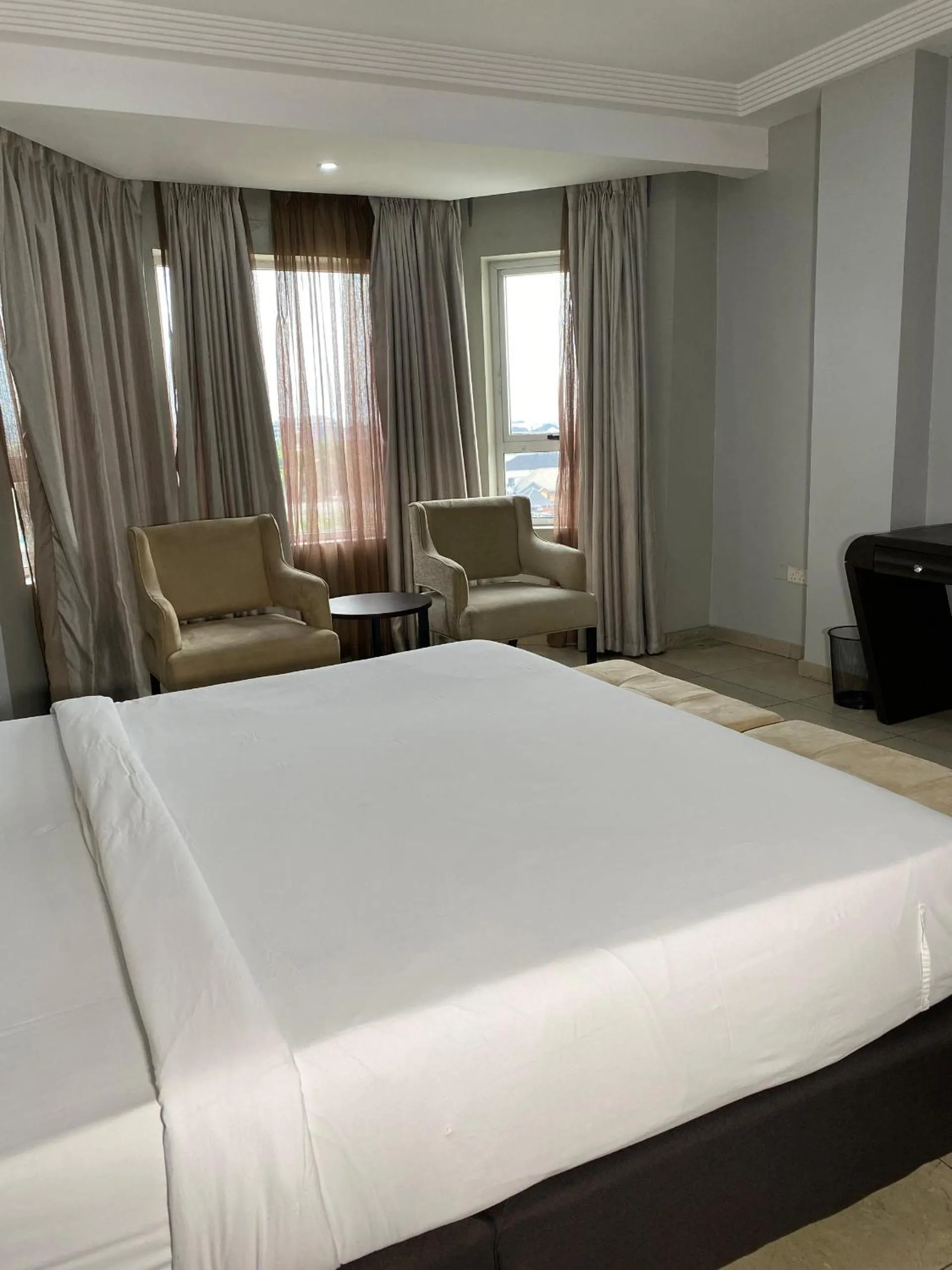 Bed in Genesis Reventon Hotel