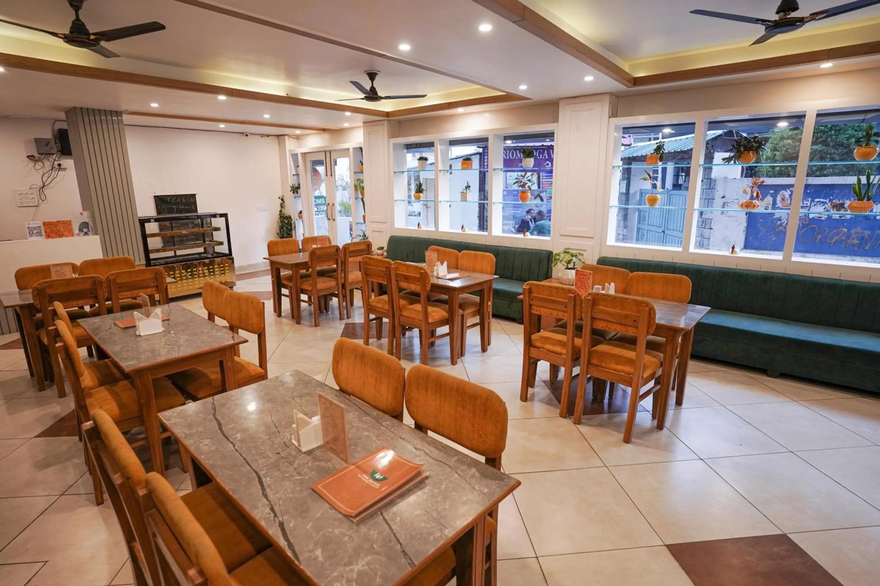 Restaurant/places to eat in Tripli Hotels Ayushman Retreat