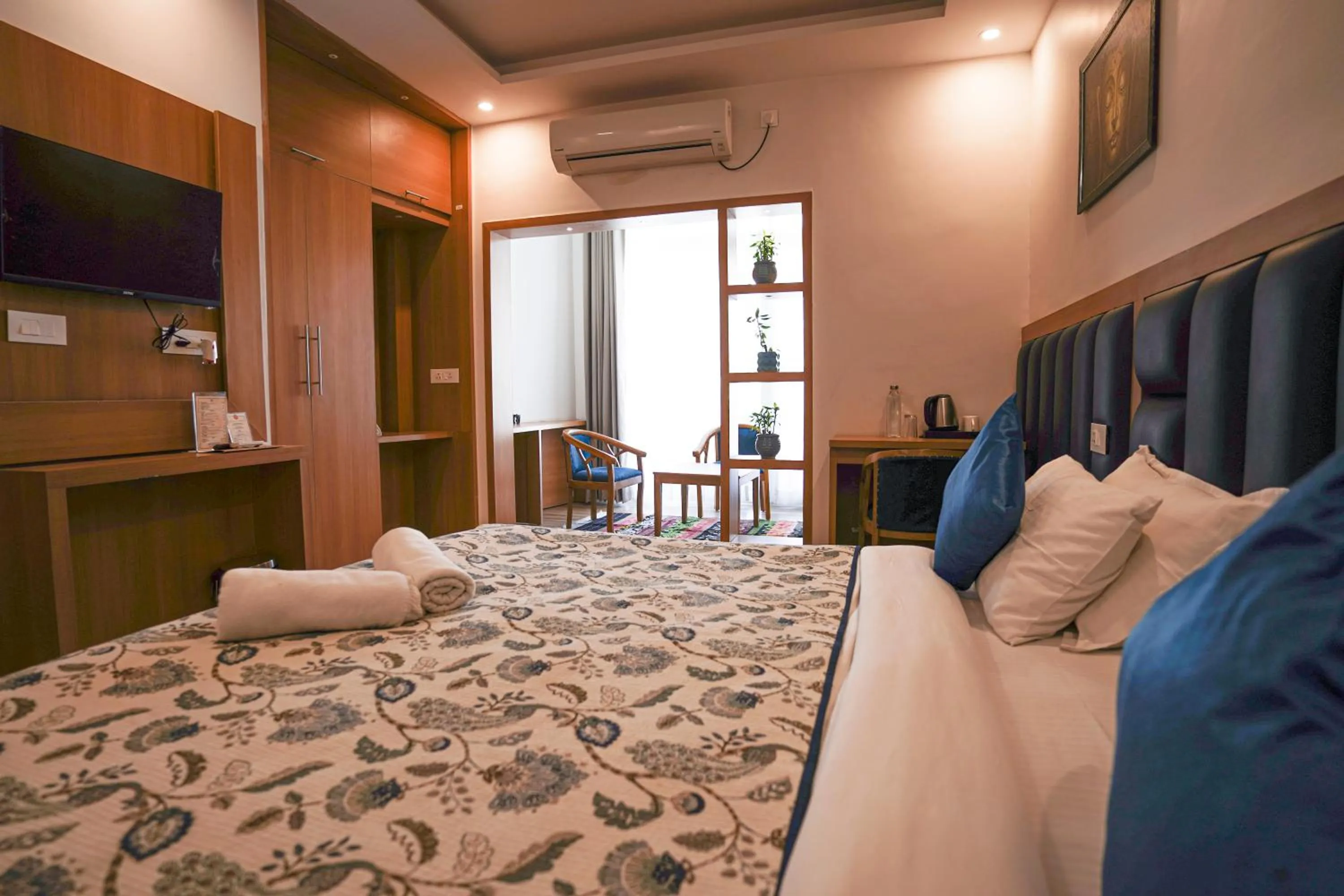 Photo of the whole room, Bed in Tripli Hotels Ayushman Retreat