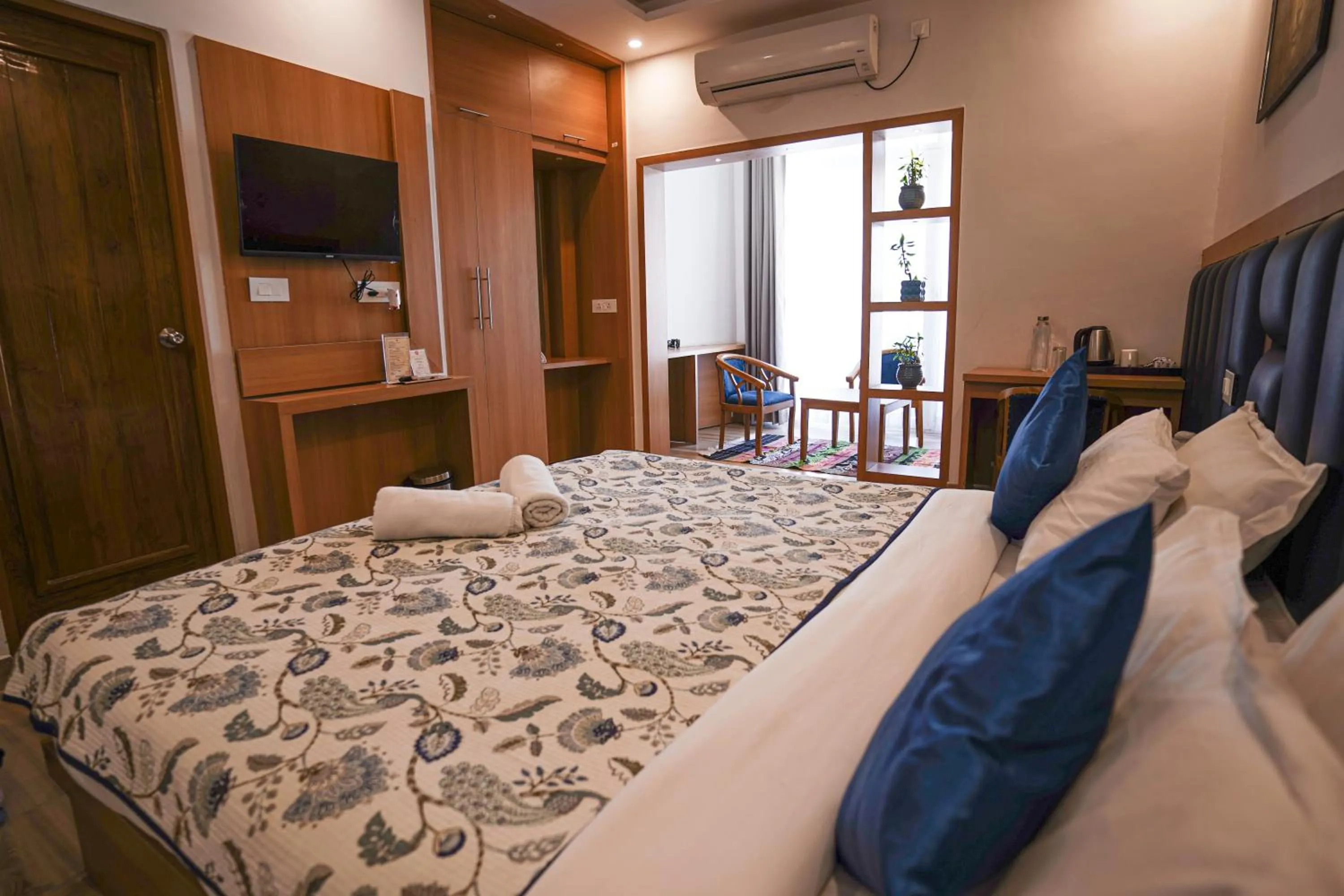 Photo of the whole room, Bed in Tripli Hotels Ayushman Retreat