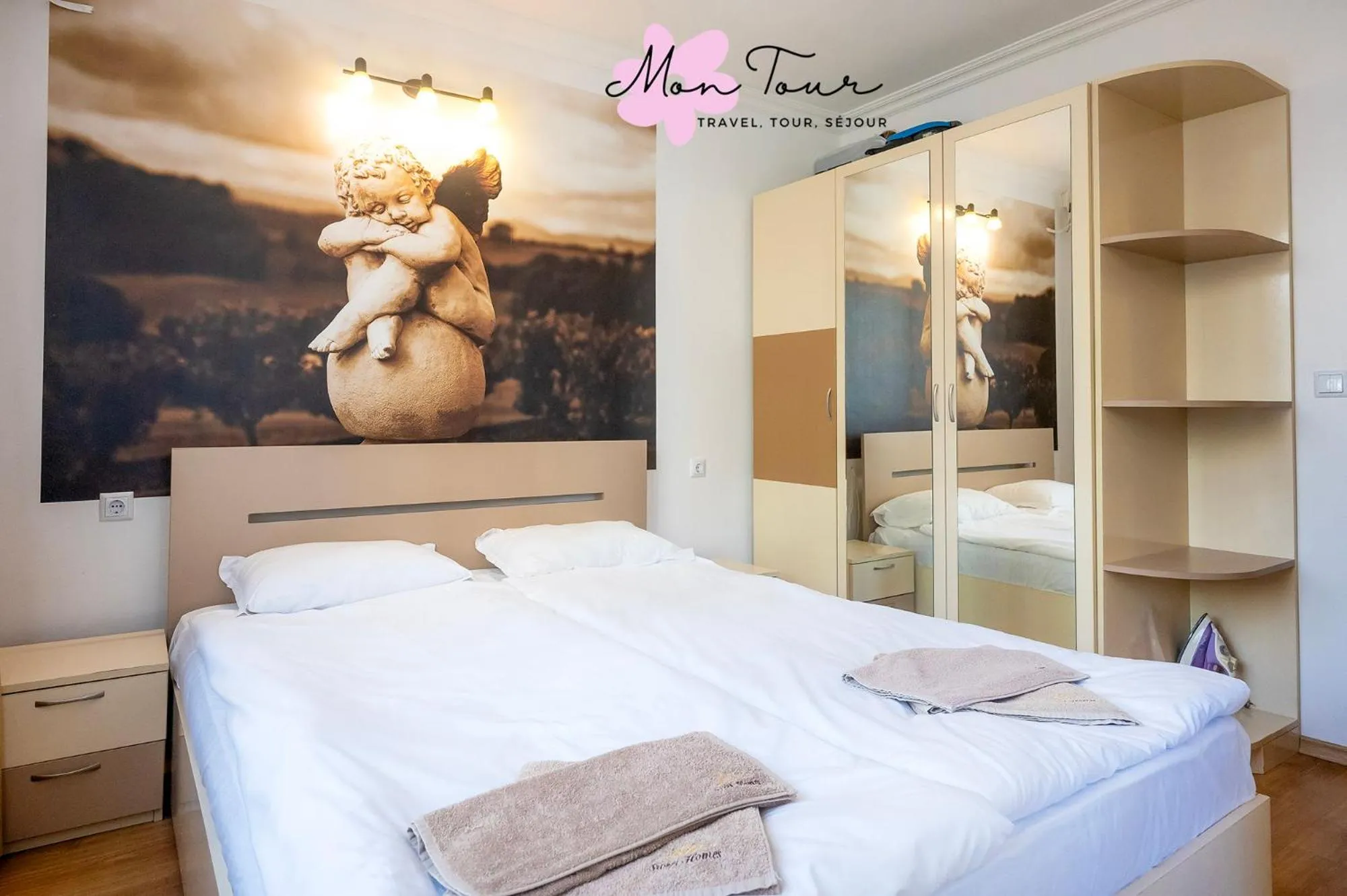 Bed in Mon Tour apartments