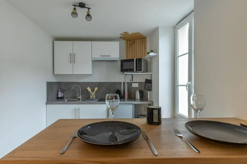 Kitchen or kitchenette in L'Appart des Platanes