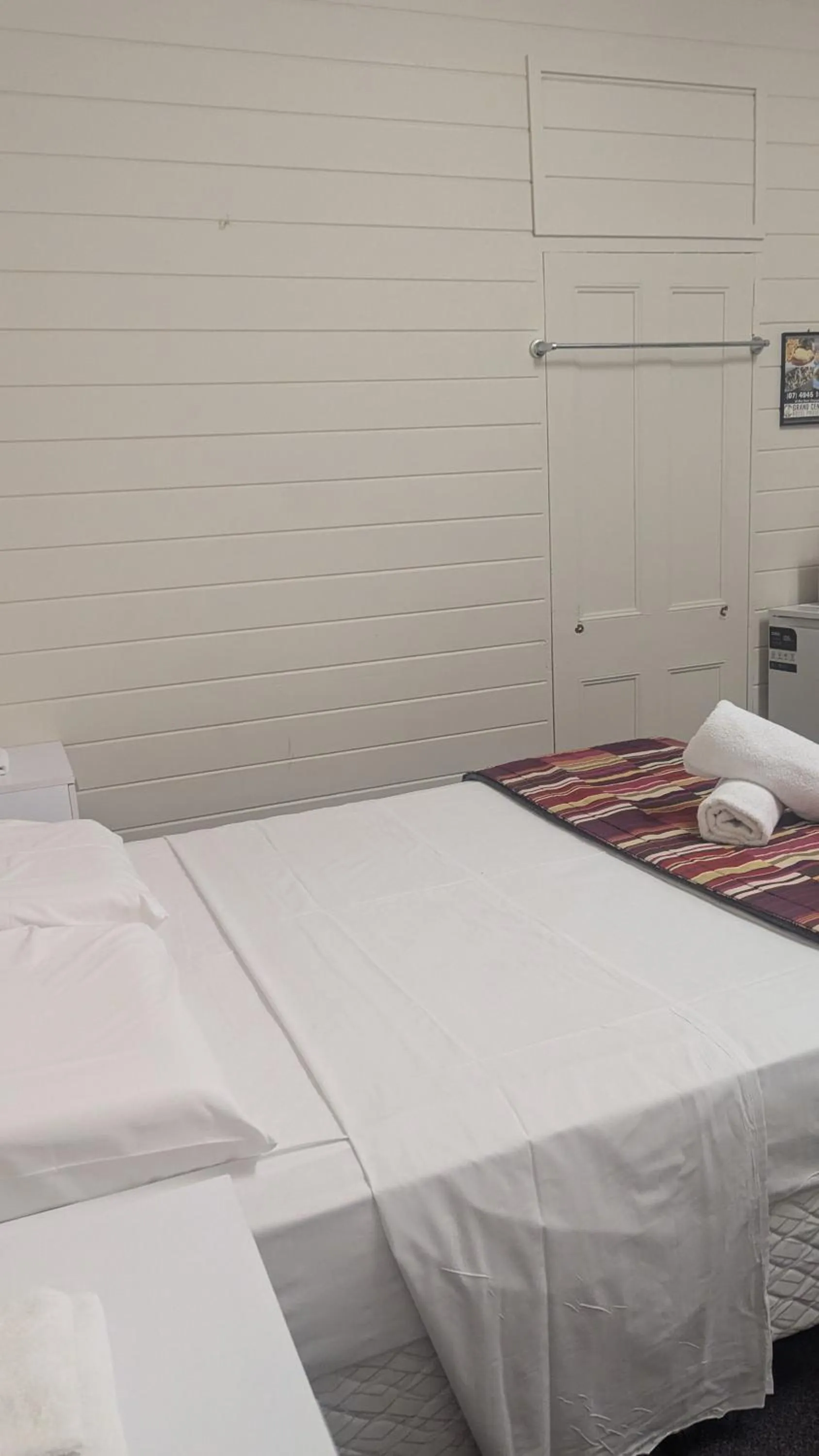 Bed in GRAND CENTRAL HOTEL PROSERPINE