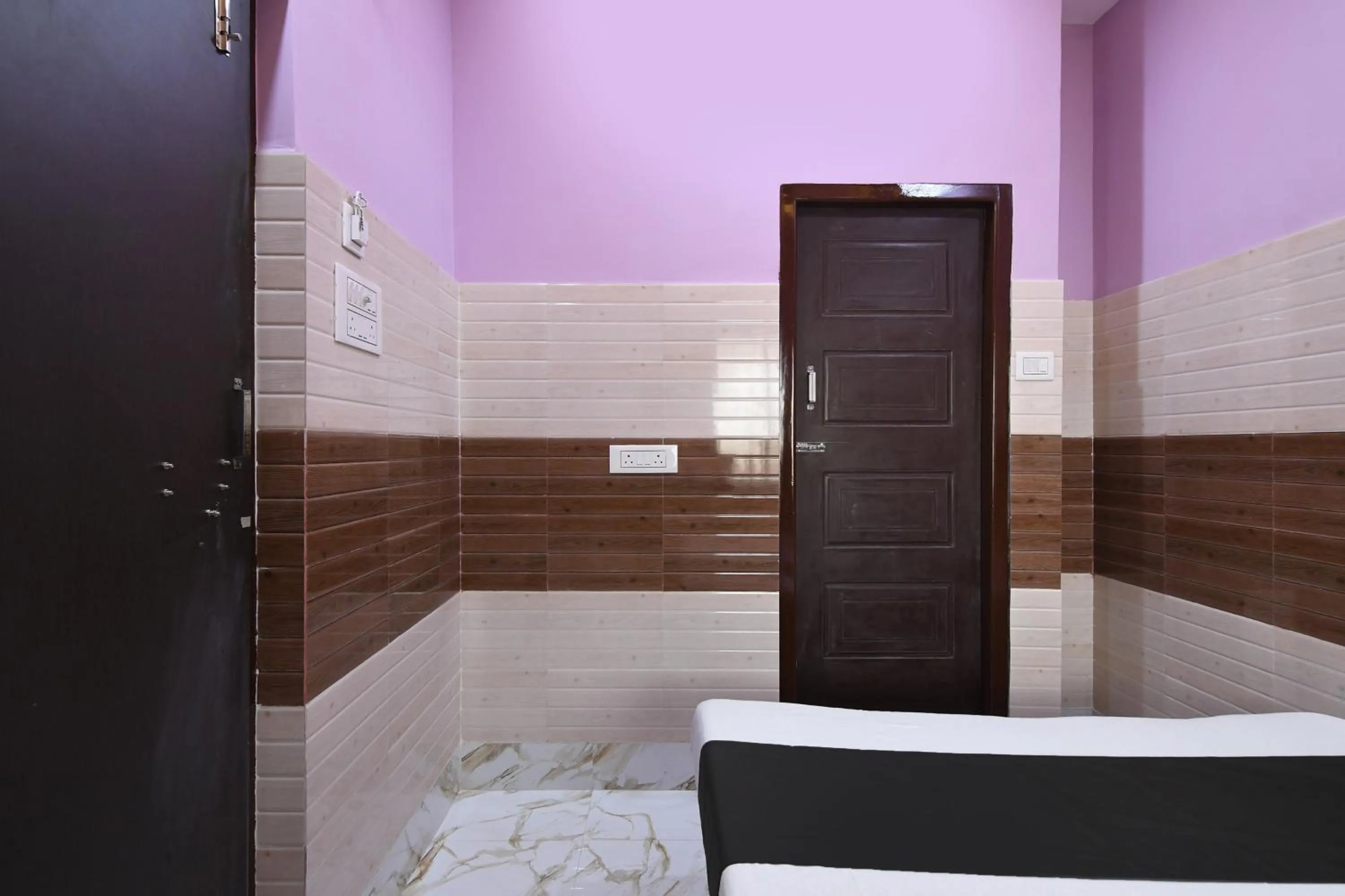 Bedroom in Hotel O PPS NEST Guest House