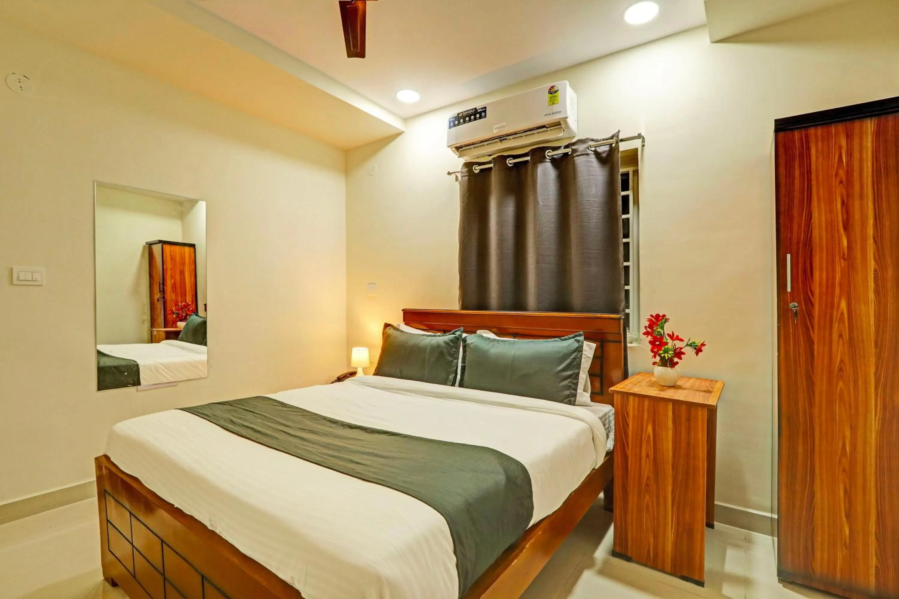 Bedroom in Hotel O JVP Hotels