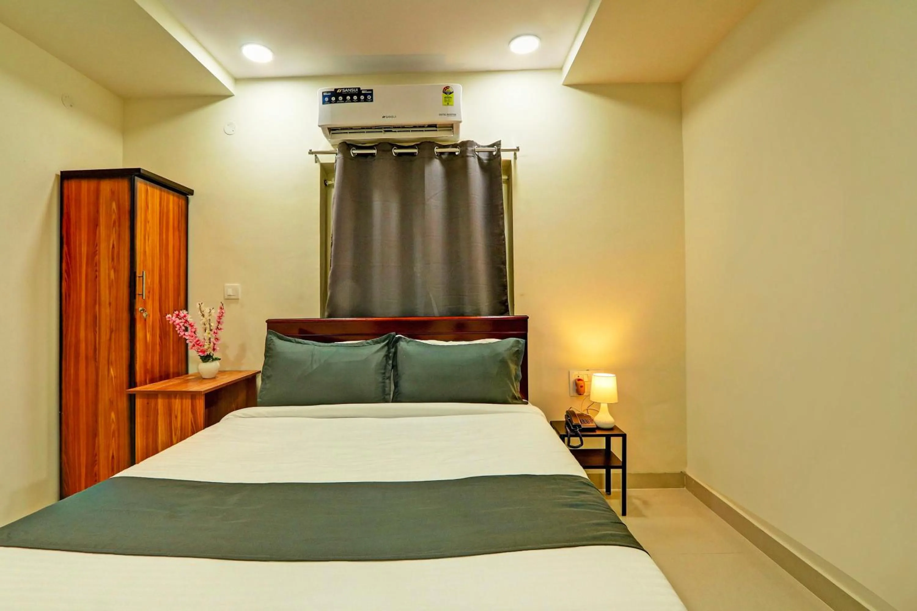 Bedroom in Hotel O JVP Hotels