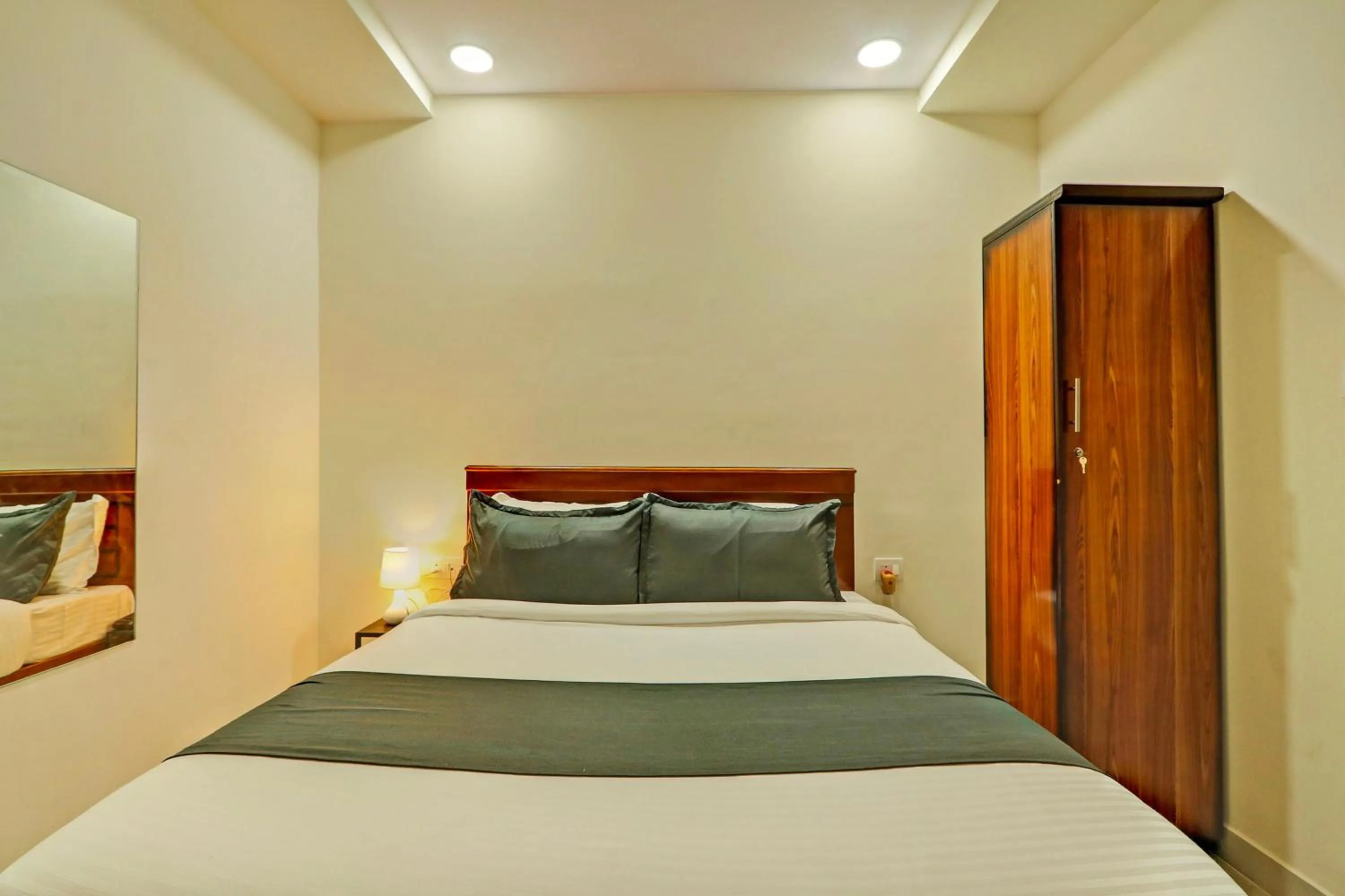 Bedroom in Hotel O JVP Hotels