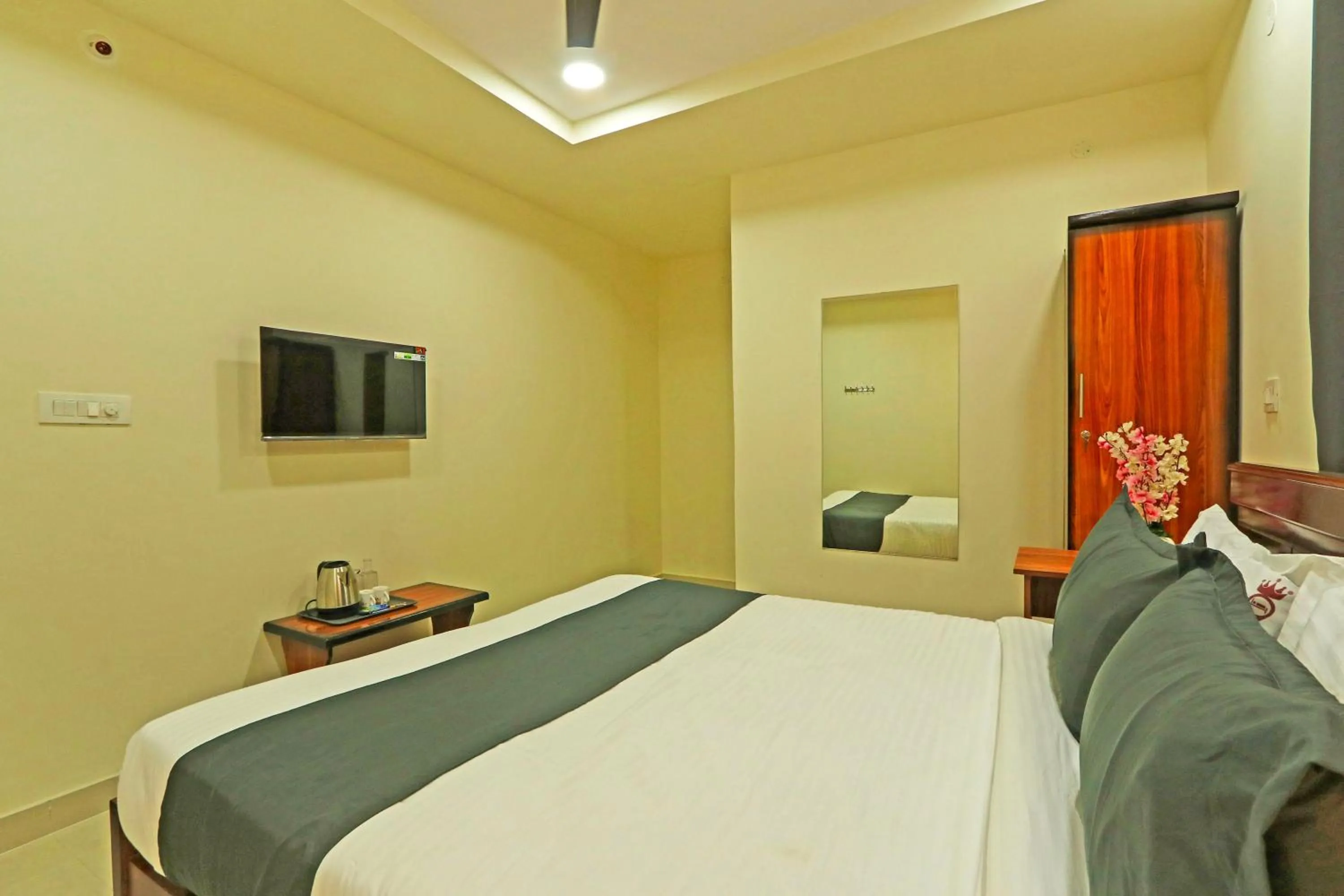 Bedroom in Hotel O JVP Hotels