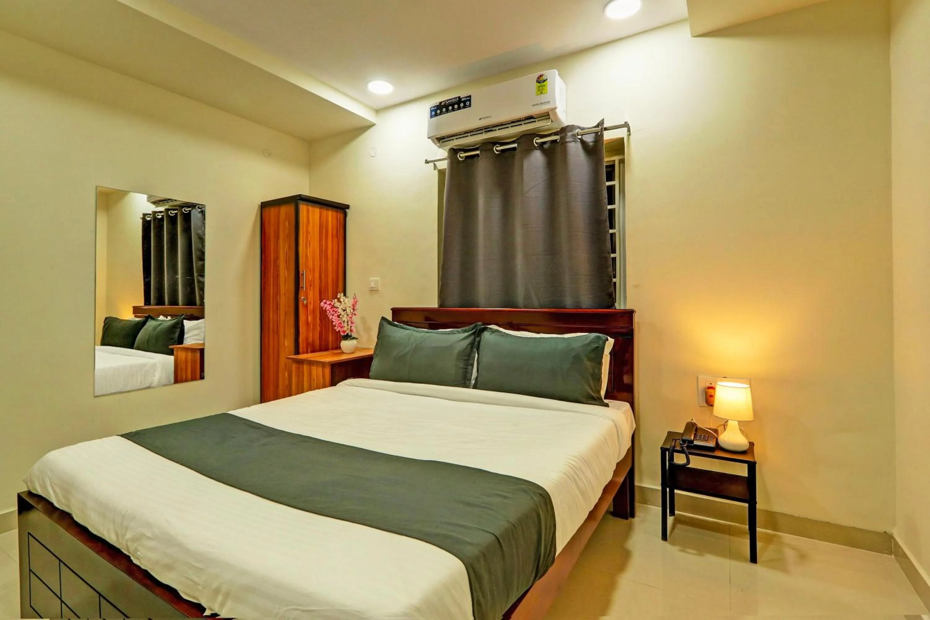 Bedroom in Hotel O JVP Hotels