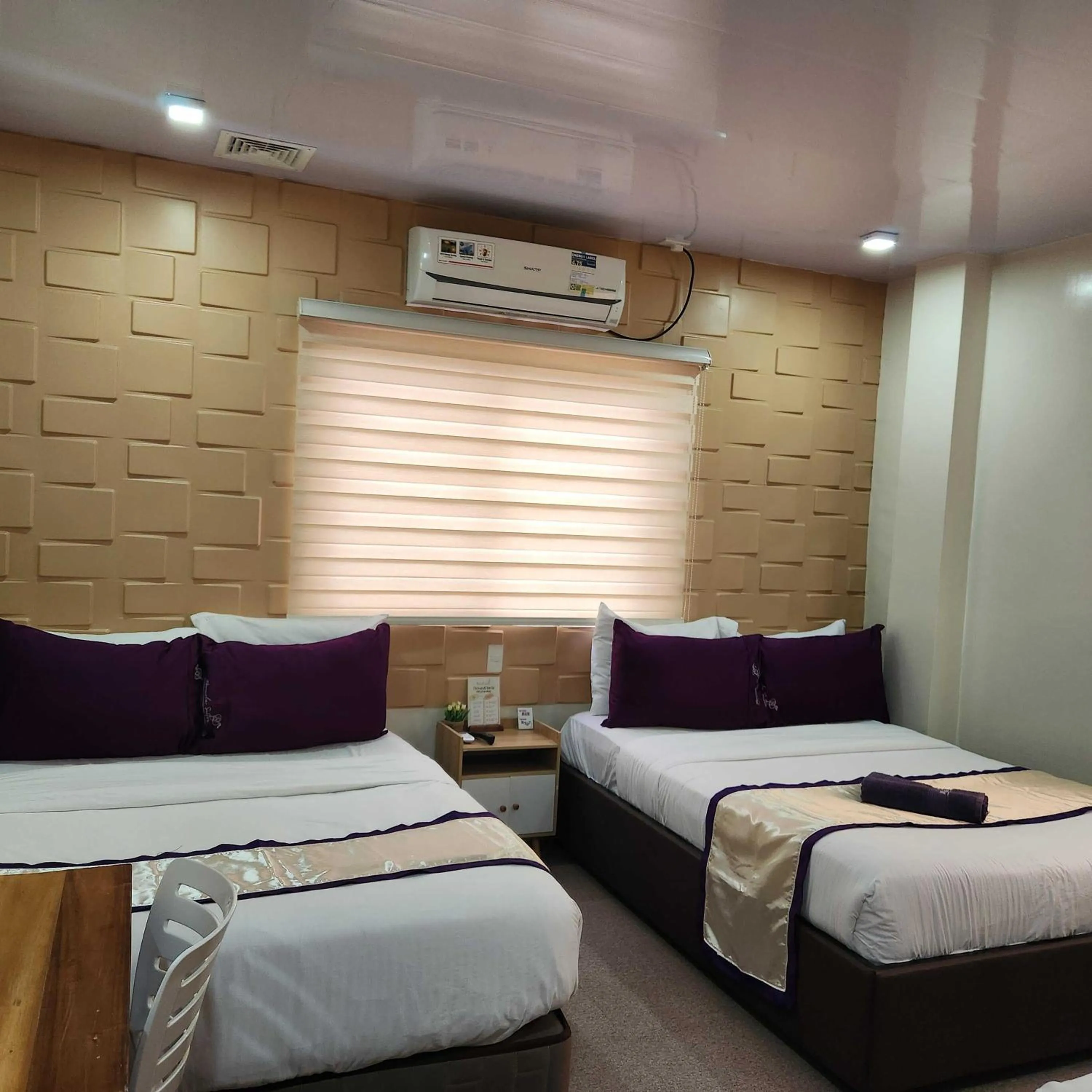 Bedroom, Bed in Manuela Suites Puerto Princesa near Airport