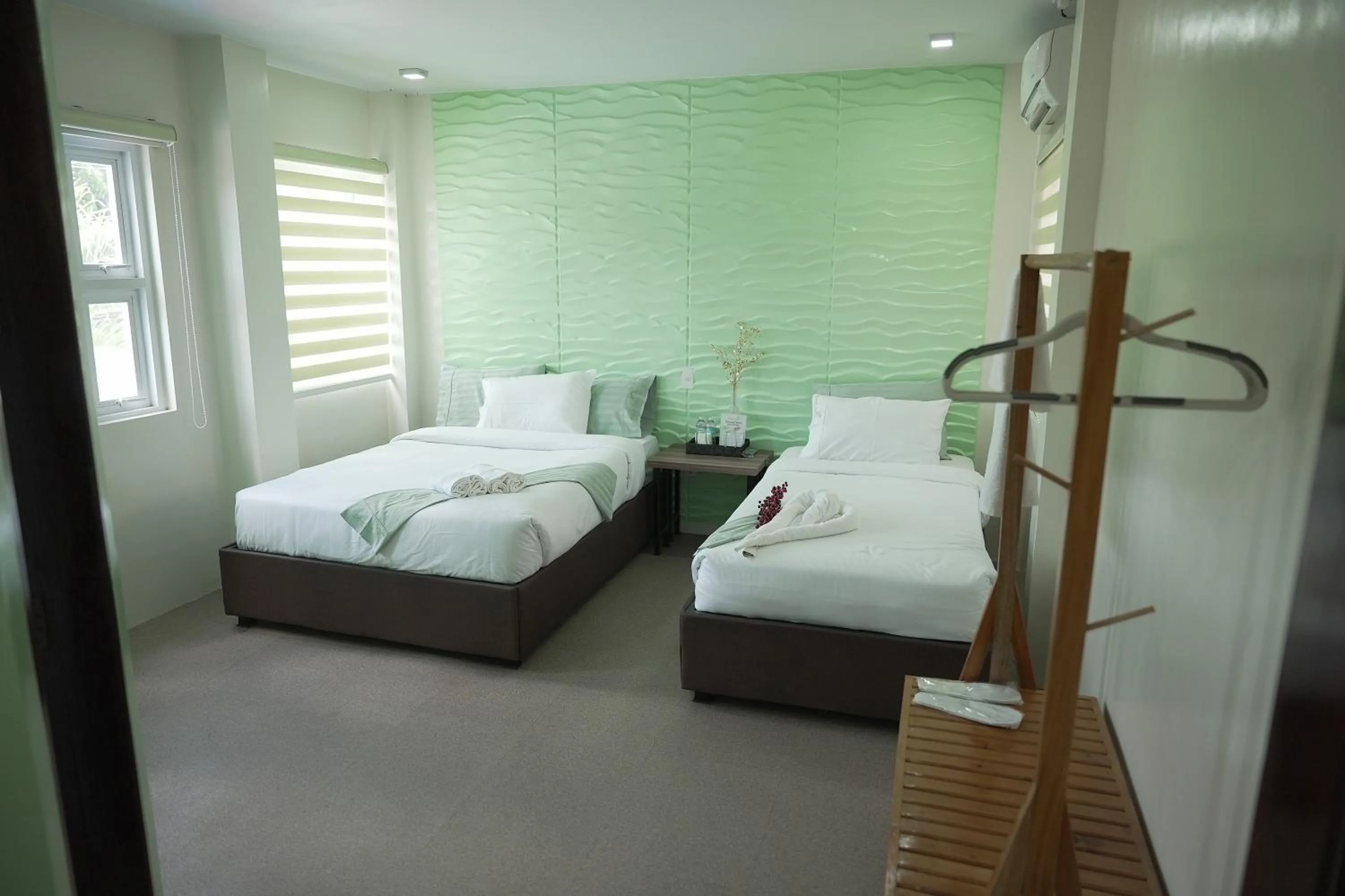 Bed in Manuela Suites Puerto Princesa near Airport