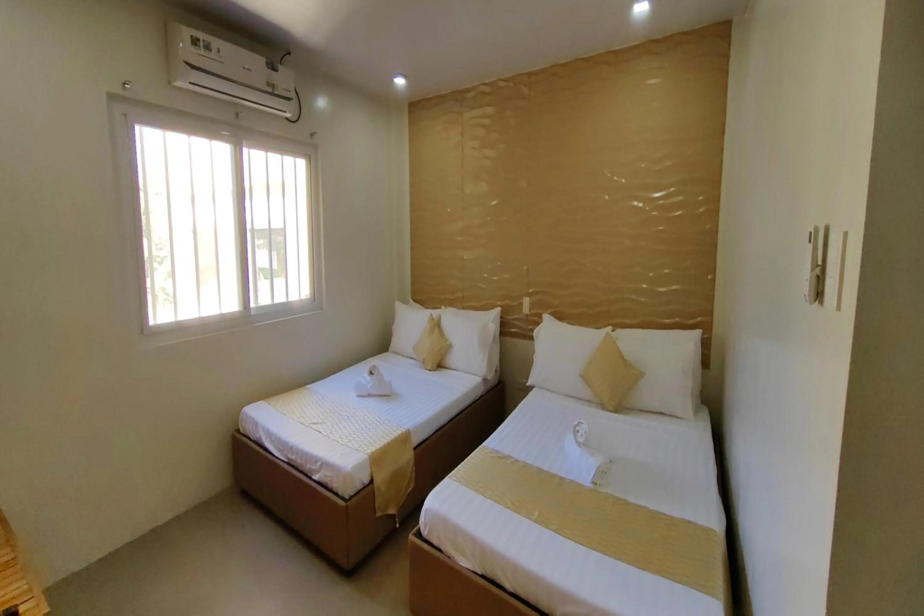 Bed in Manuela Suites Puerto Princesa near Airport