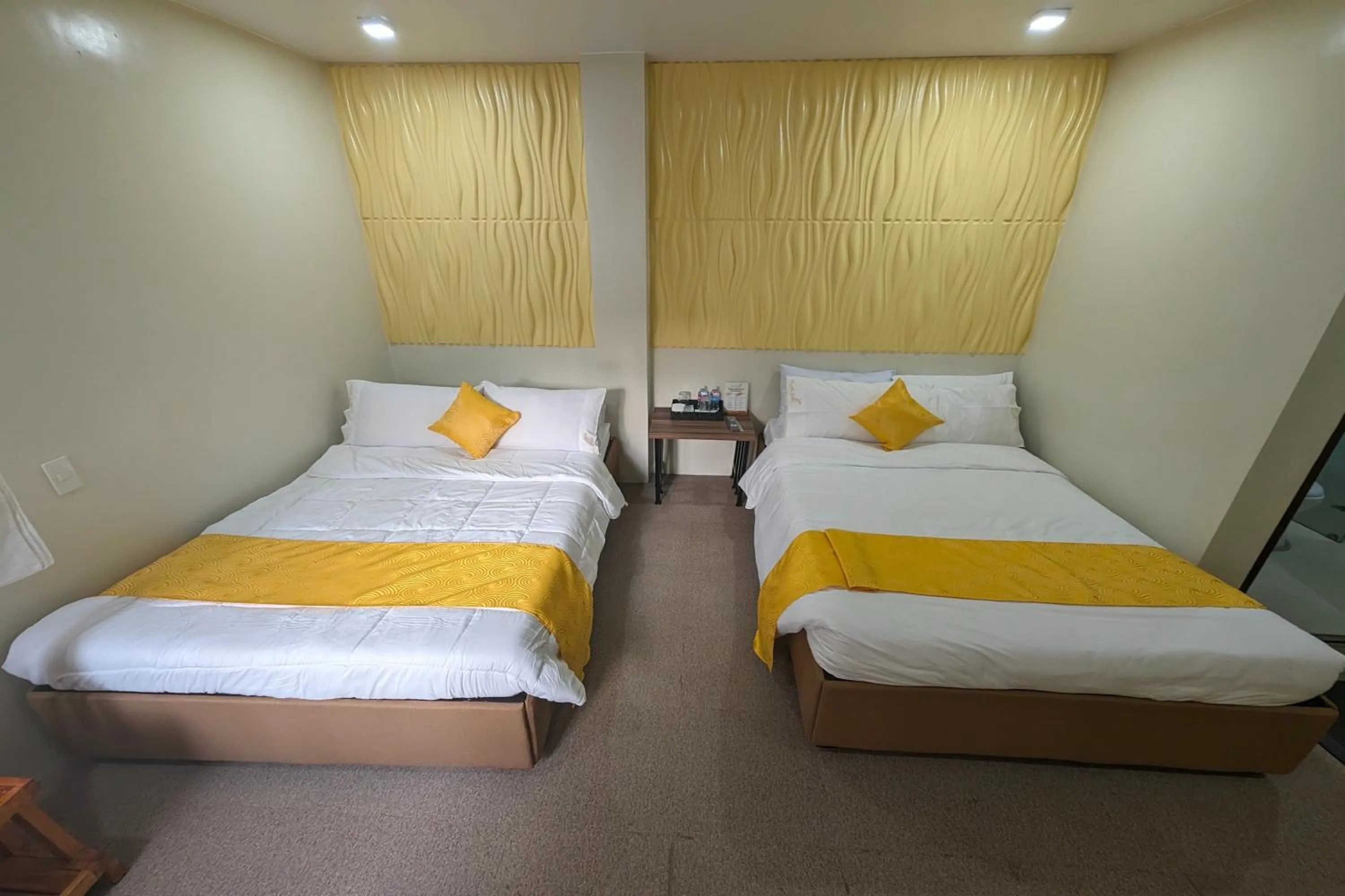 Bed in Manuela Suites Puerto Princesa near Airport