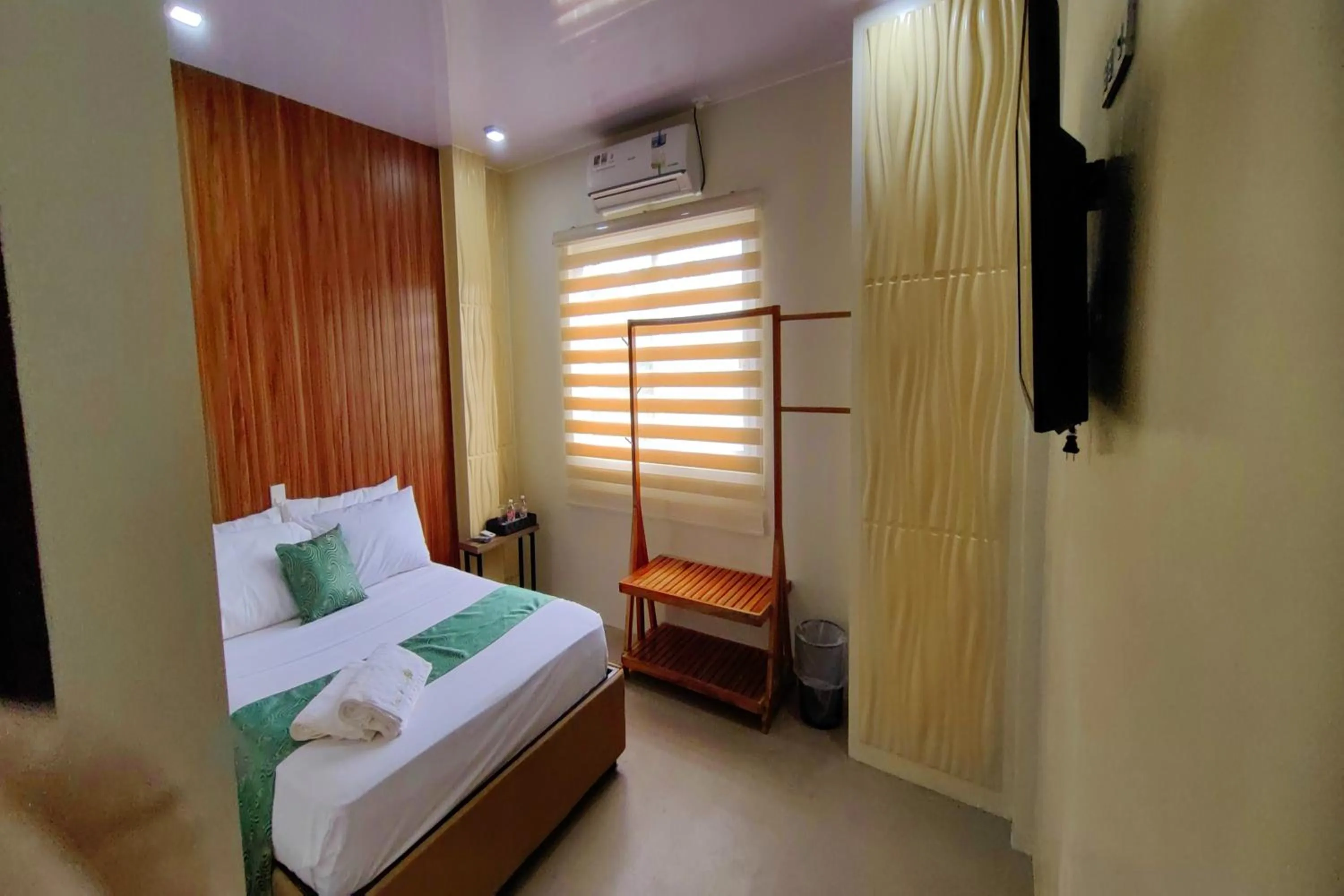 Bed in Manuela Suites Puerto Princesa near Airport