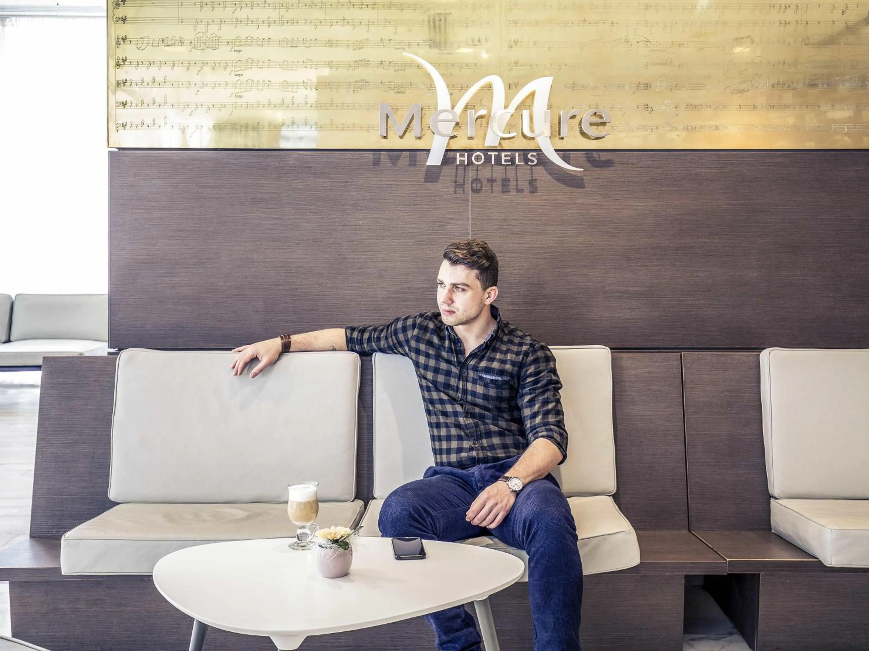 Lounge or bar in Mercure Bucharest City Center