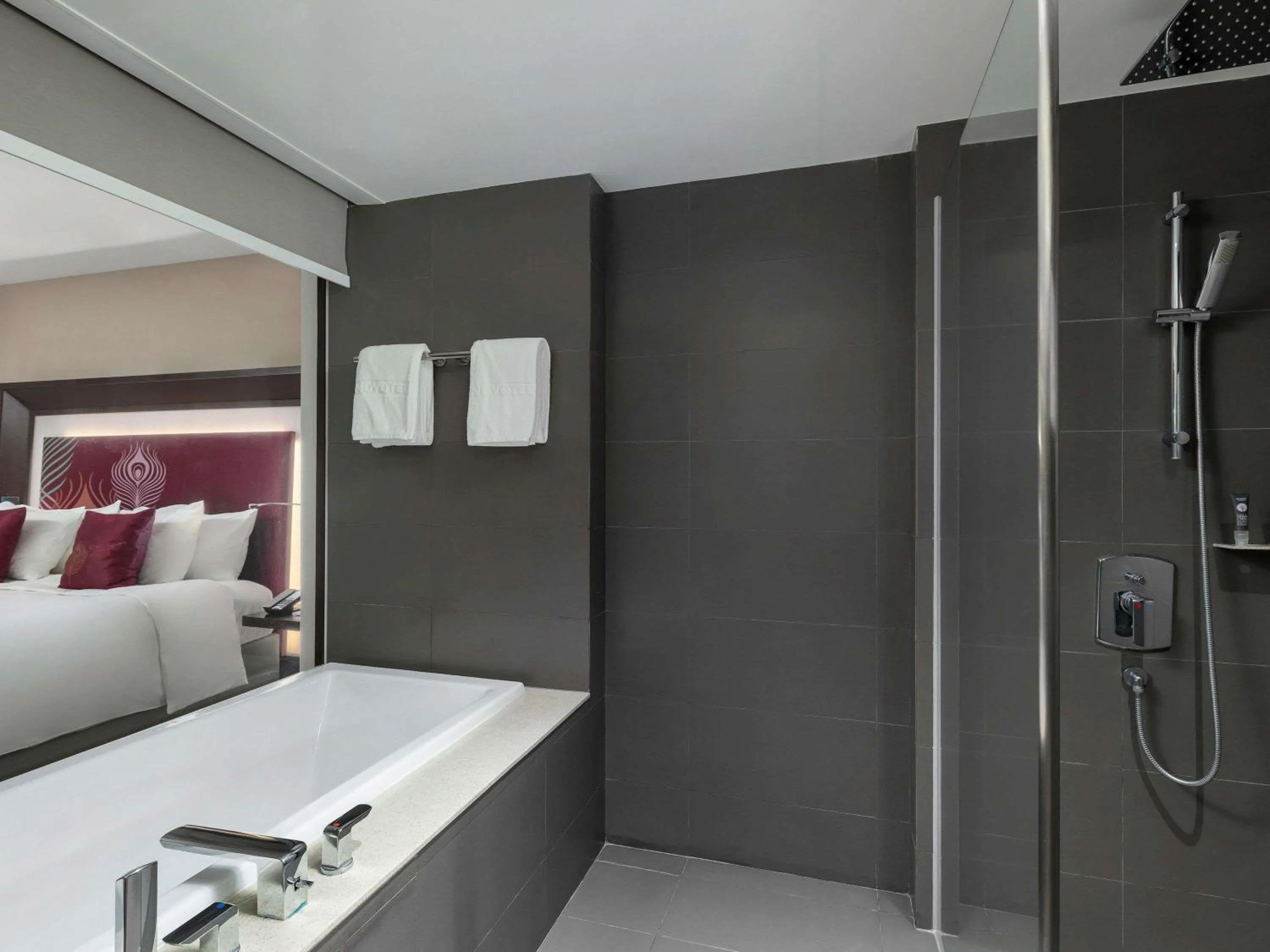 Photo of the whole room, Bed in Novotel Yangon Max