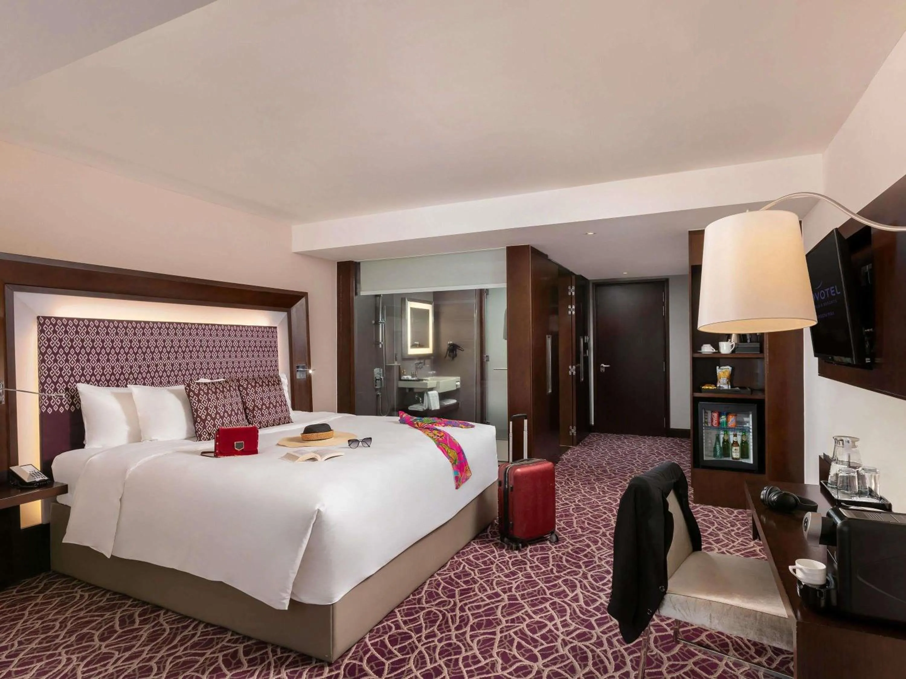 Photo of the whole room, Bed in Novotel Yangon Max