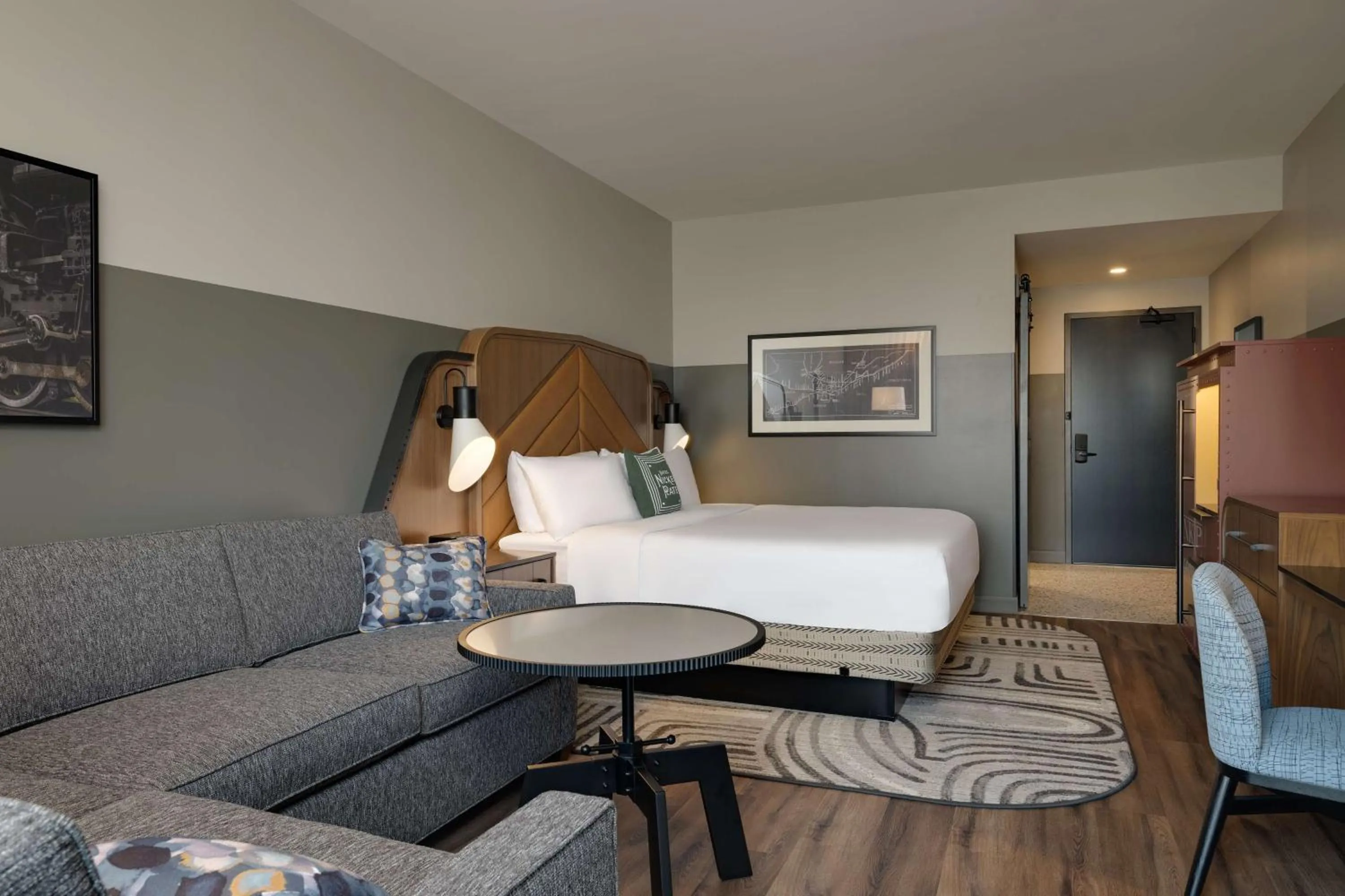 Living room in Hotel Nickel Plate Fishers, Tapestry Collection By Hilton