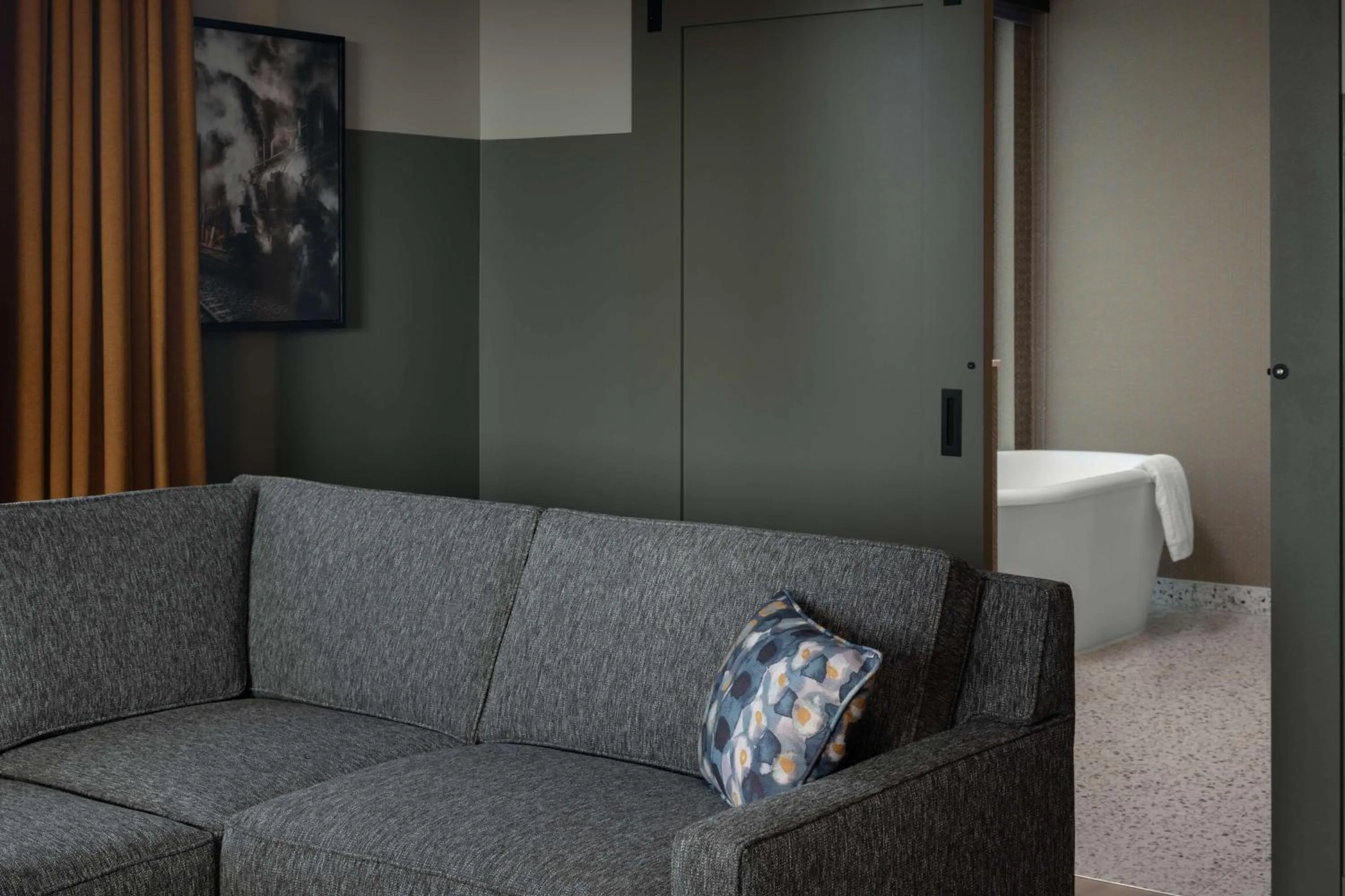 Living room in Hotel Nickel Plate Fishers, Tapestry Collection By Hilton