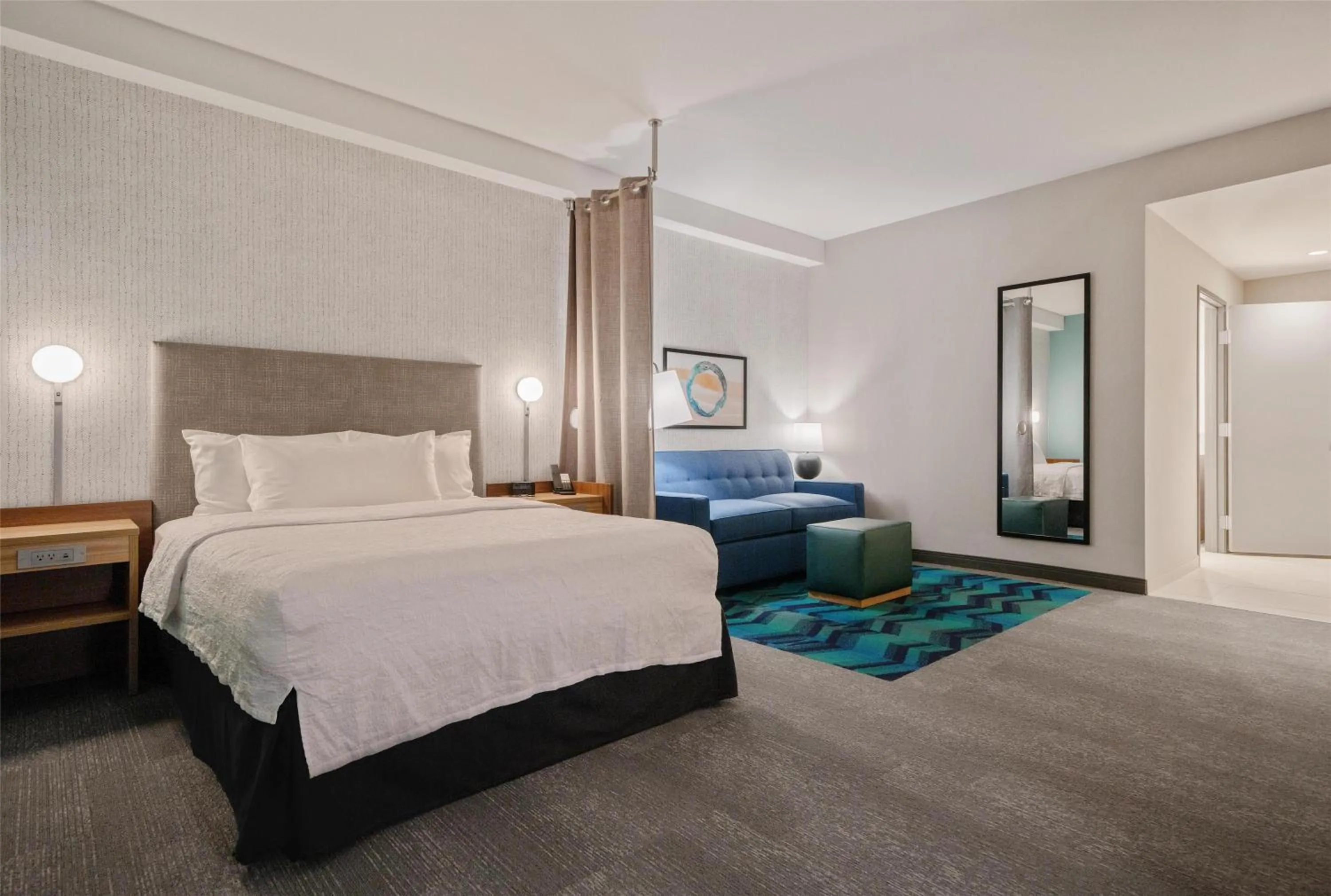 Living room, Bed in Home2 Suites by Hilton Fort Walton Beach Eglin AirForce Base