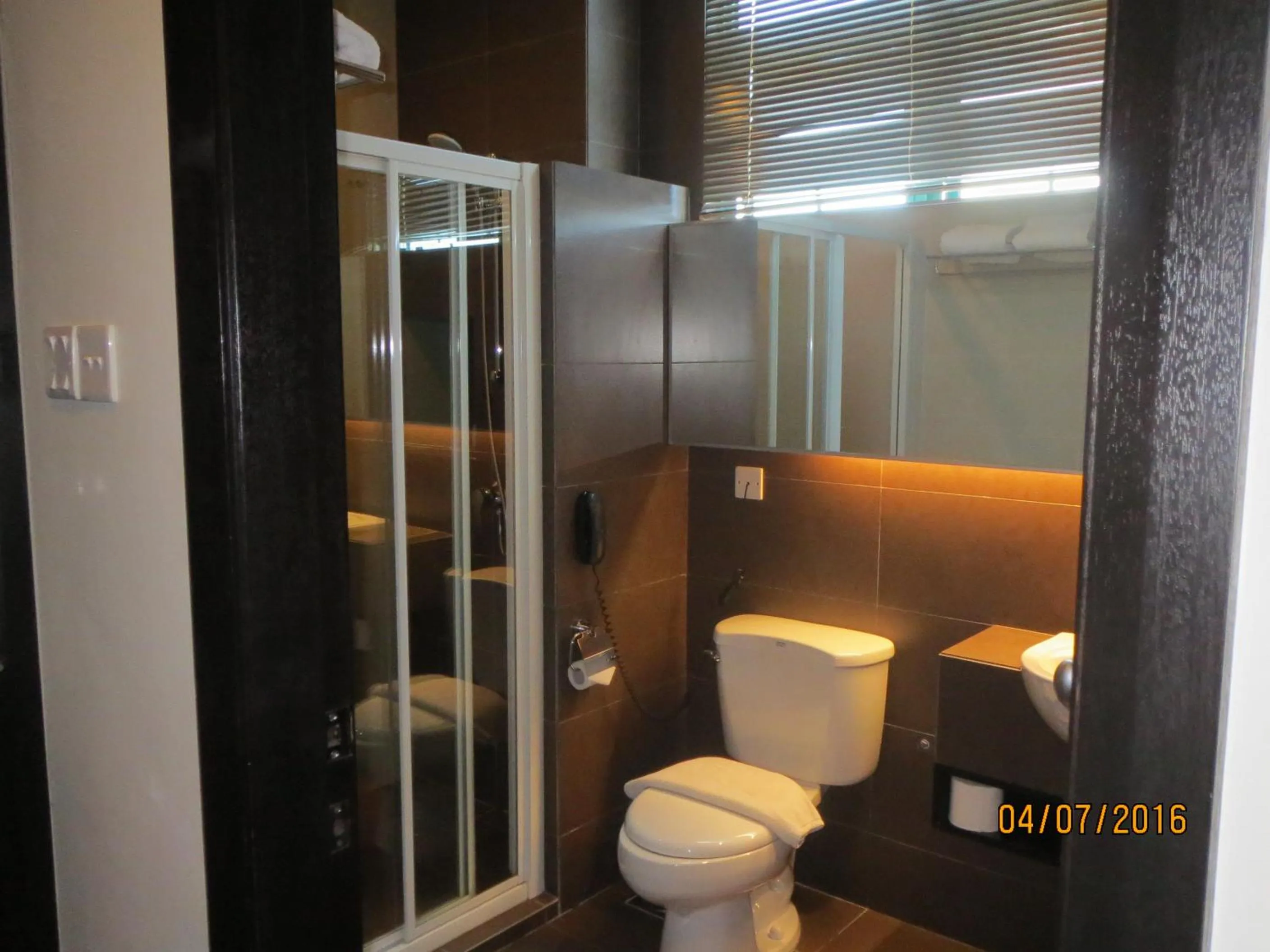 Bathroom in Tat Place Hotel