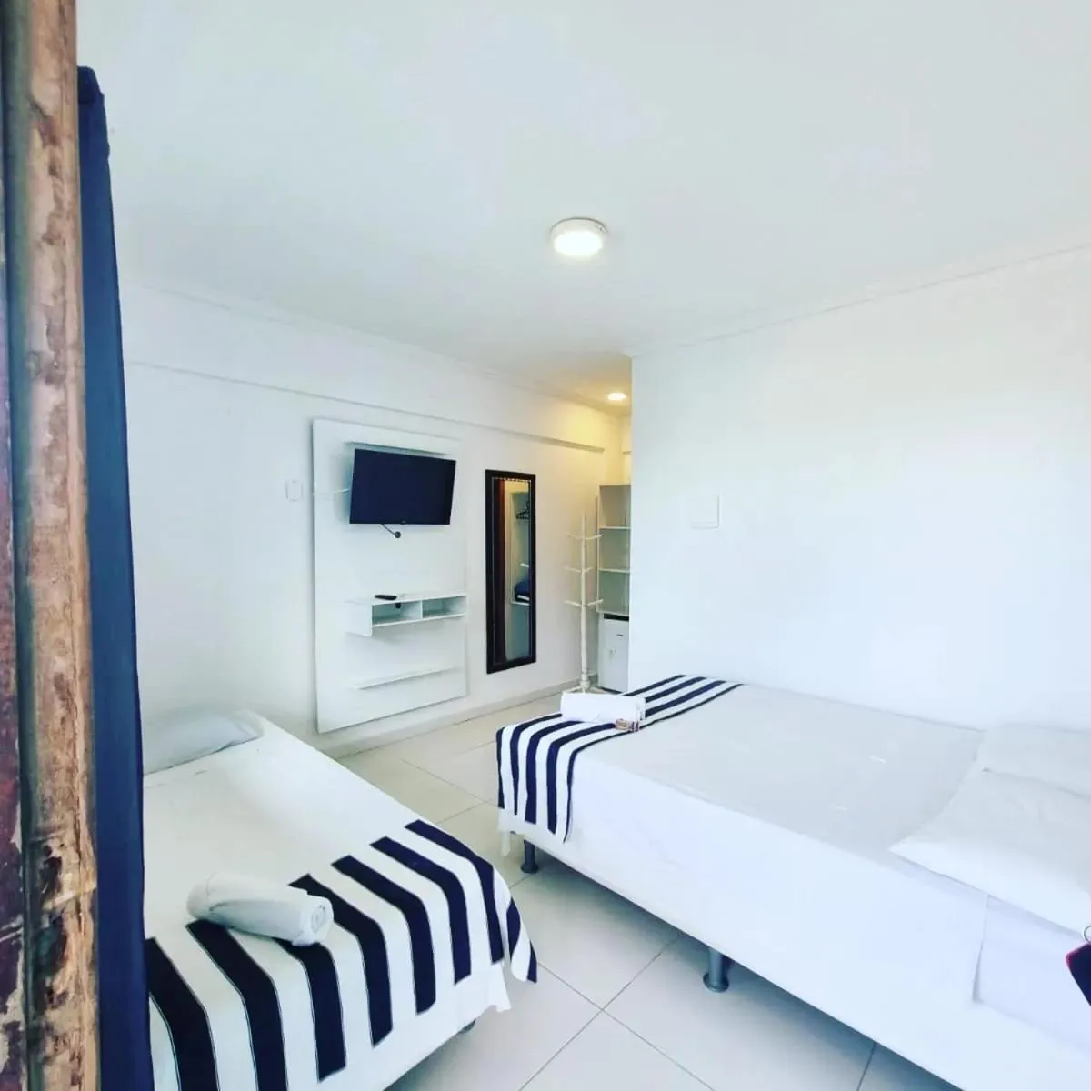 Photo of the whole room, Bed in Terra Nova Cabo Frio Front Beach