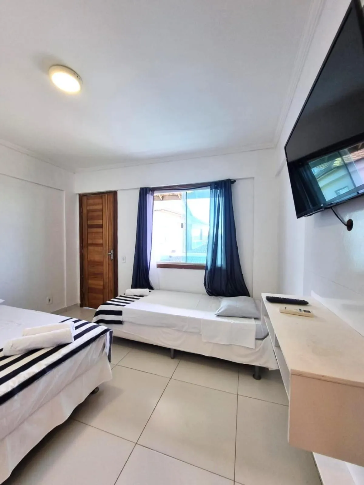 Photo of the whole room, Bed in Terra Nova Cabo Frio Front Beach