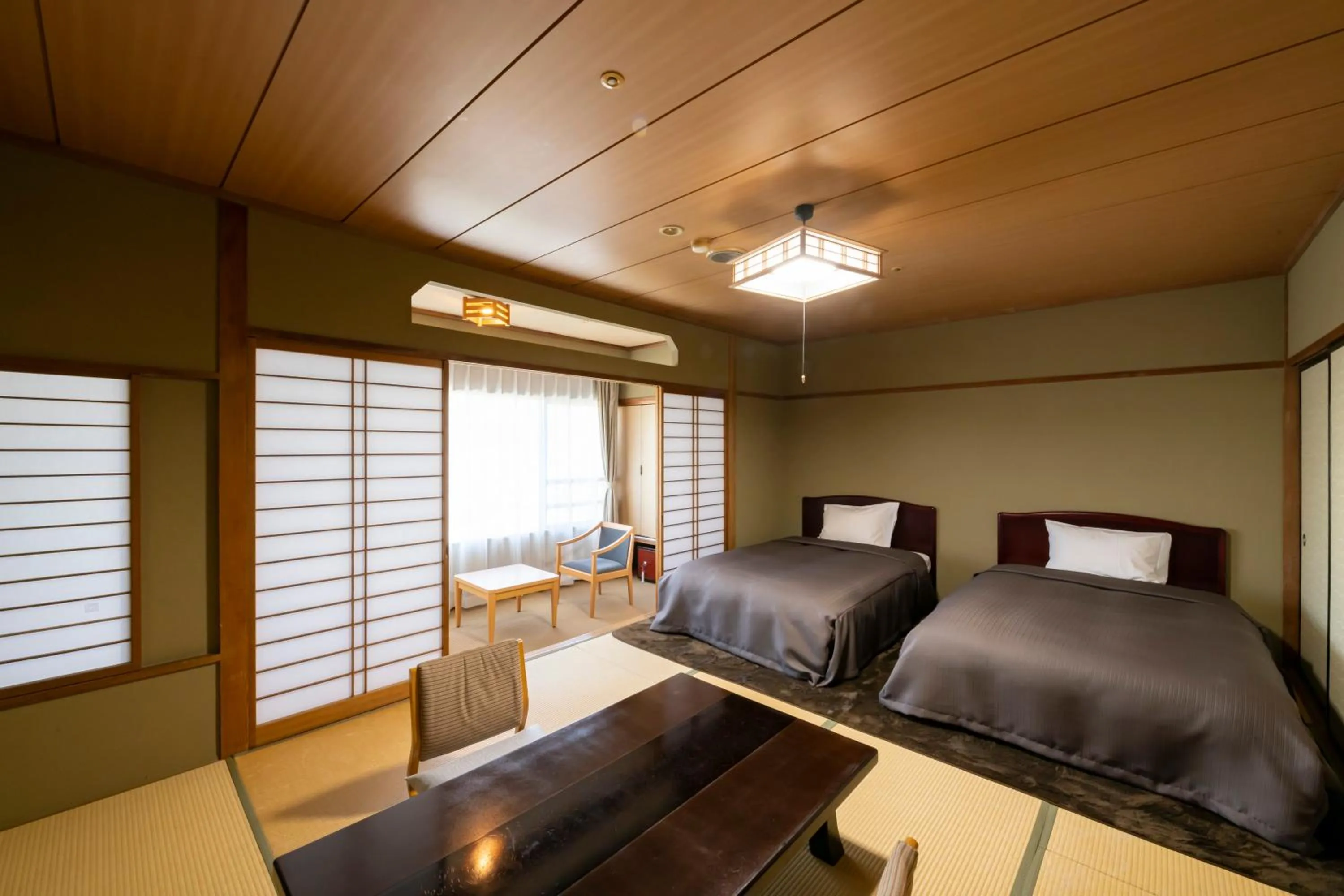 Bed in Isawa Tokiwa Hotel