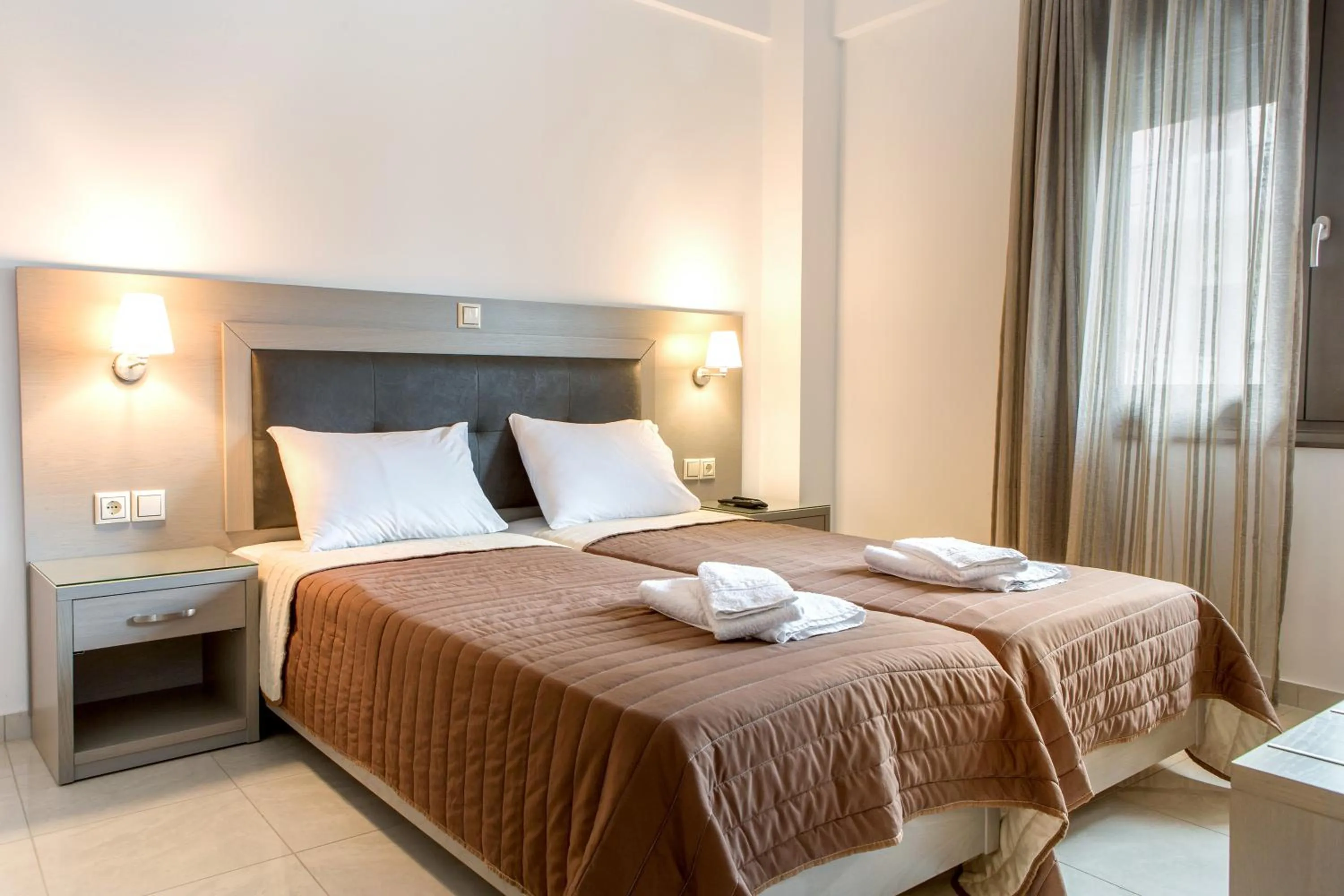 Bed in Angela Apartments