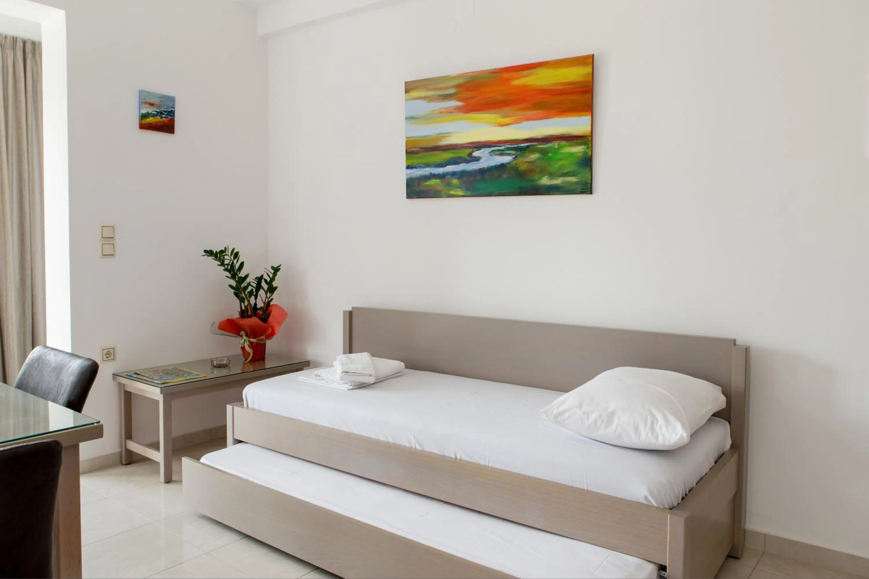 Seating area, Bed in Angela Apartments