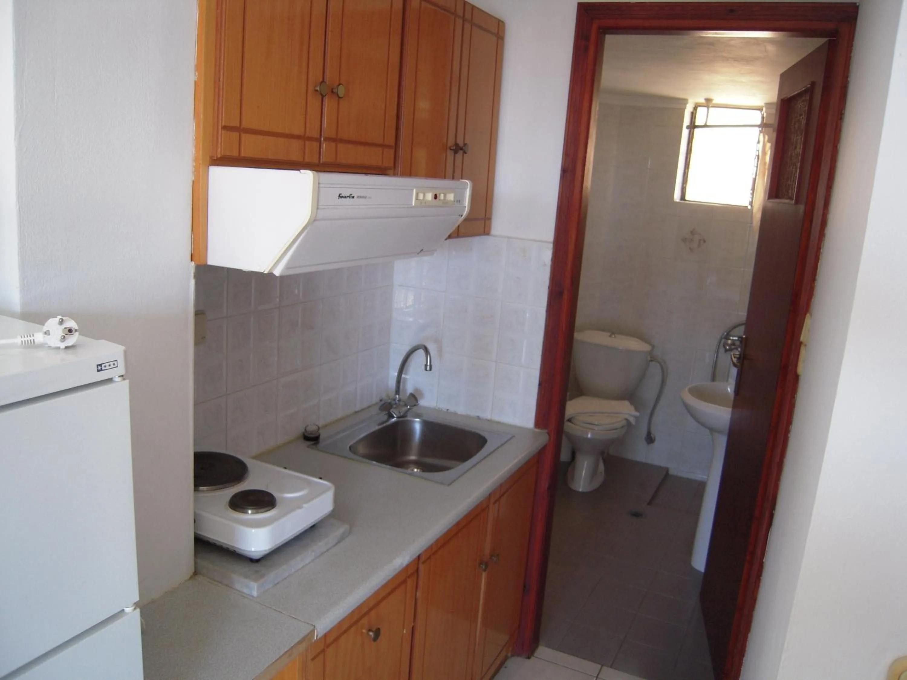 Kitchen or kitchenette in Angela Apartments