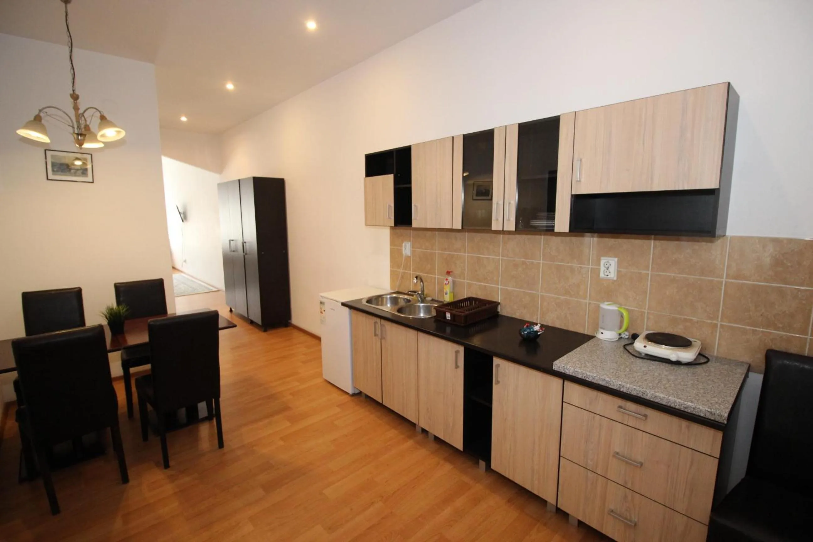 Kitchen or kitchenette in Main Square Apartments & More