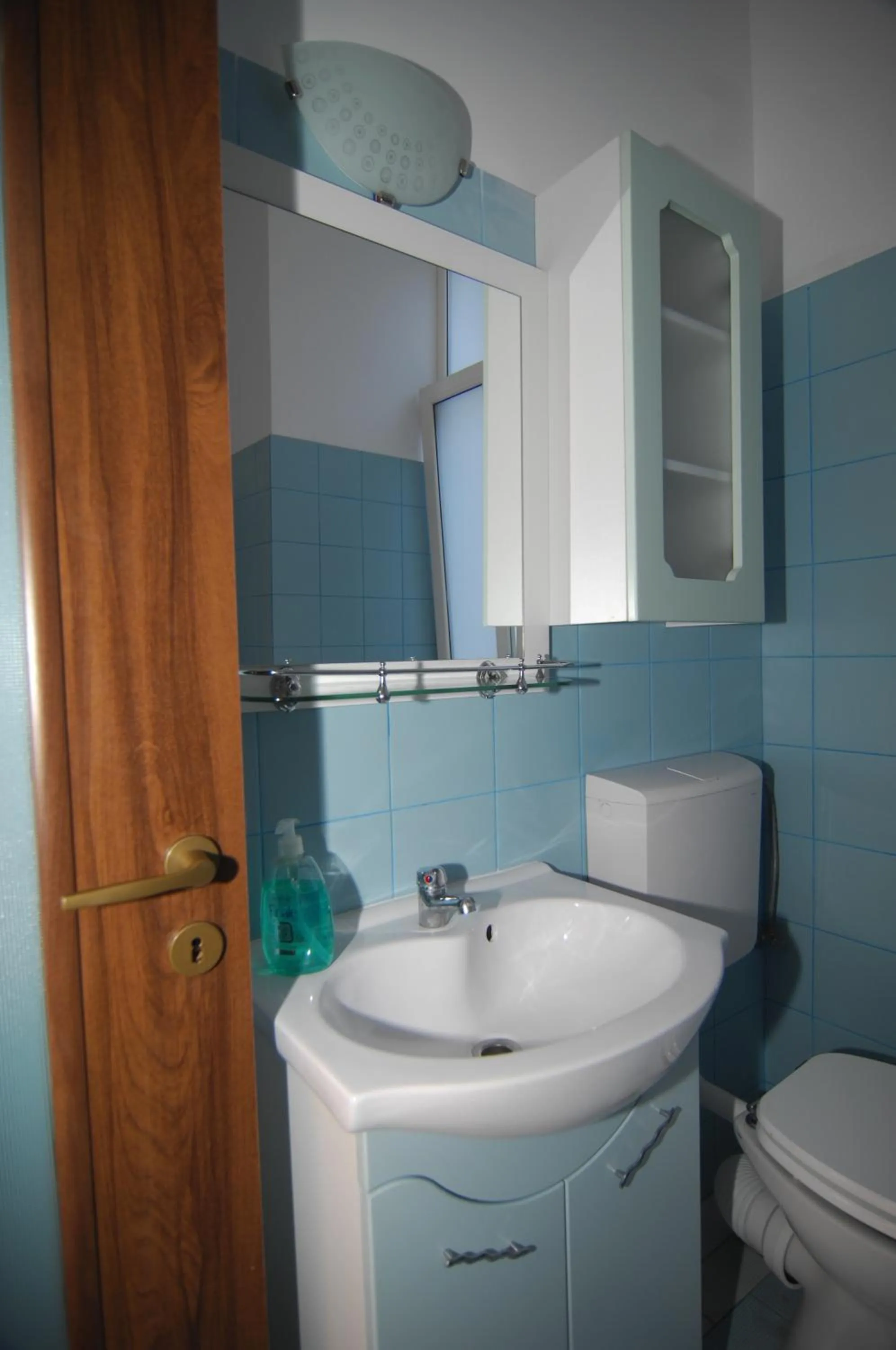 Bathroom in Main Square Apartments & More