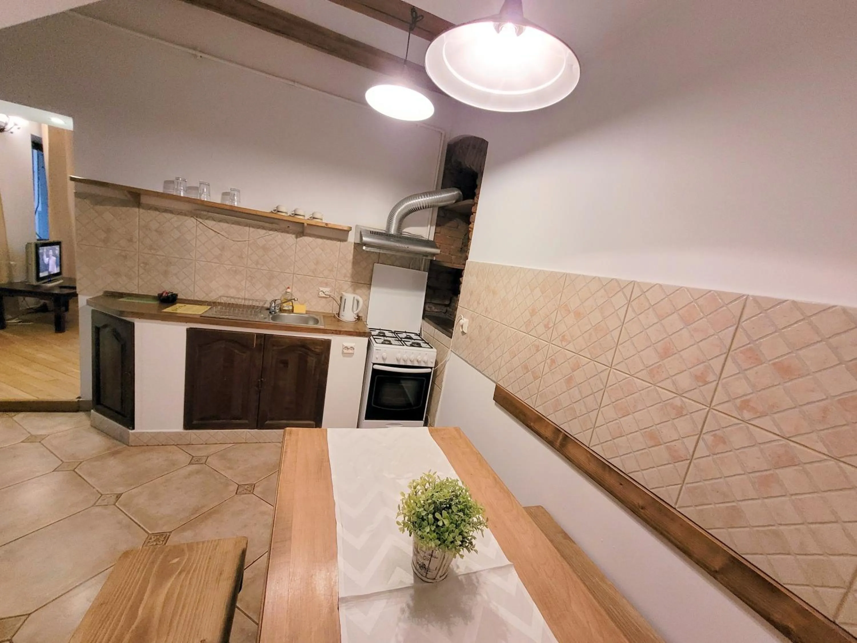 Kitchen or kitchenette in Main Square Apartments & More
