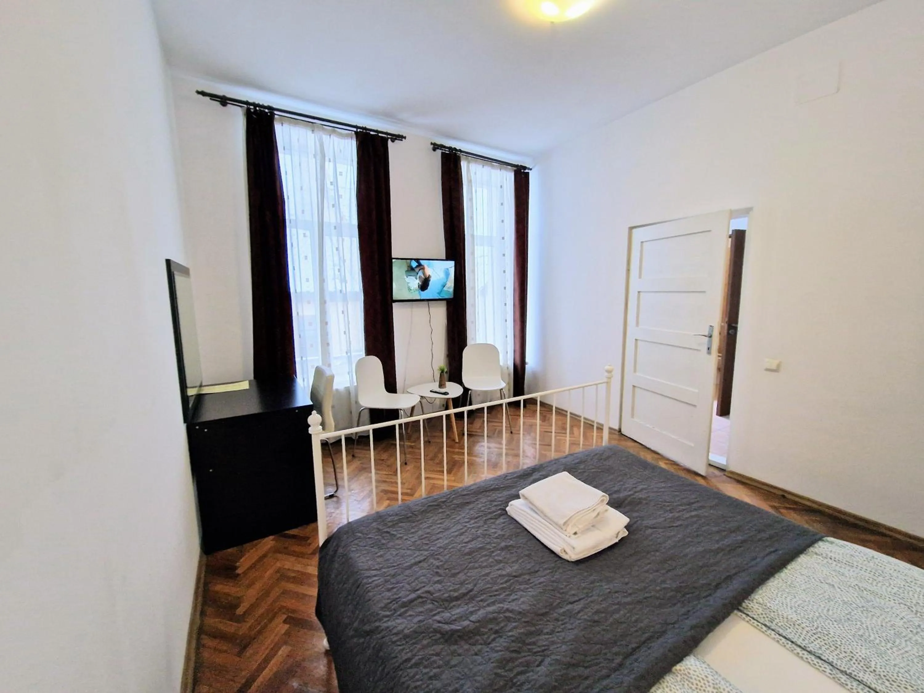 Bedroom, Bed in Main Square Apartments & More