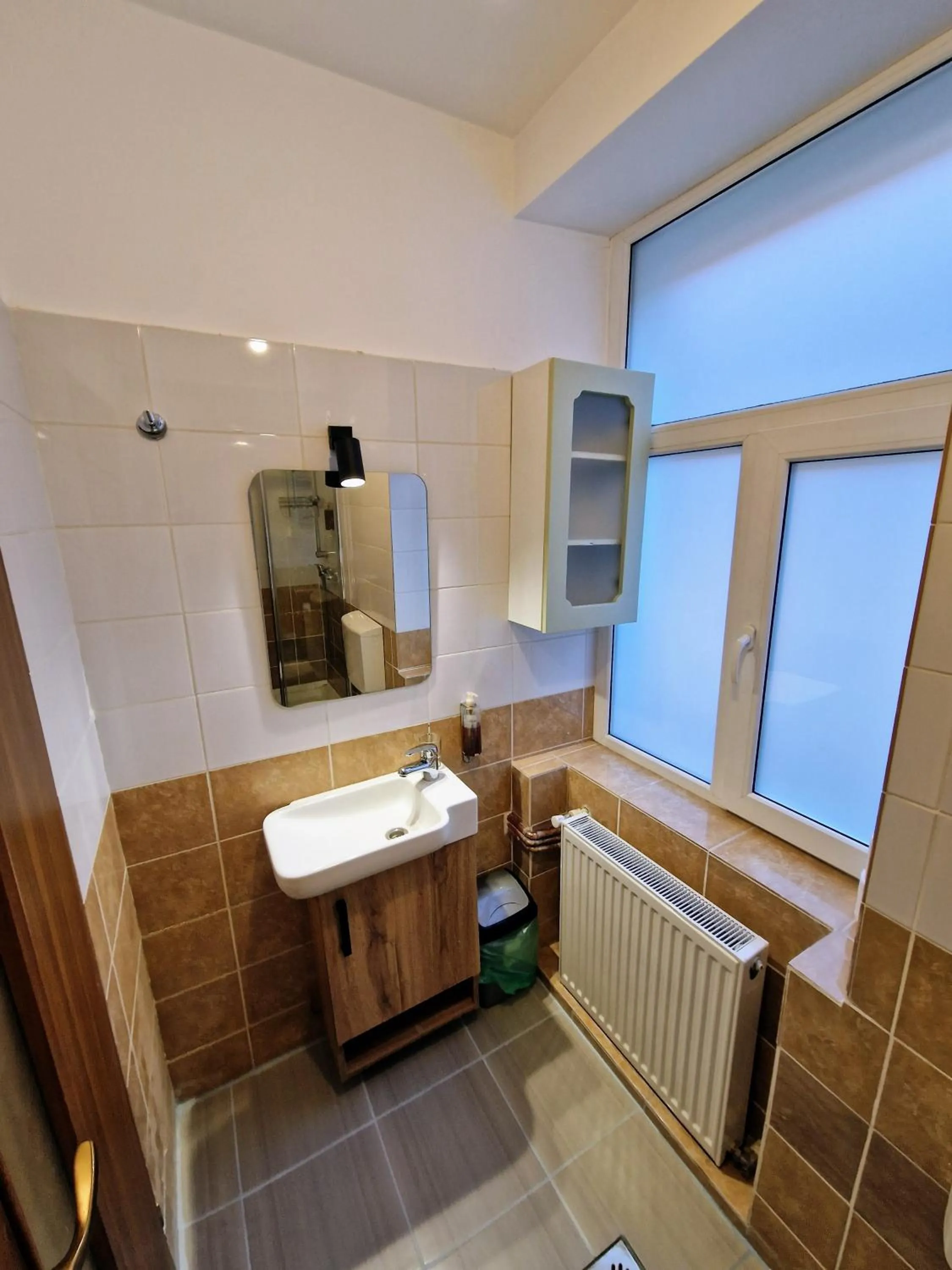 Bathroom in Main Square Apartments & More