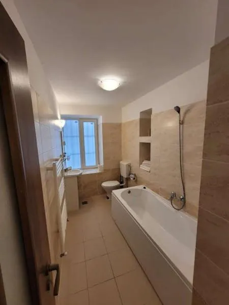 Bathroom in Main Square Apartments & More