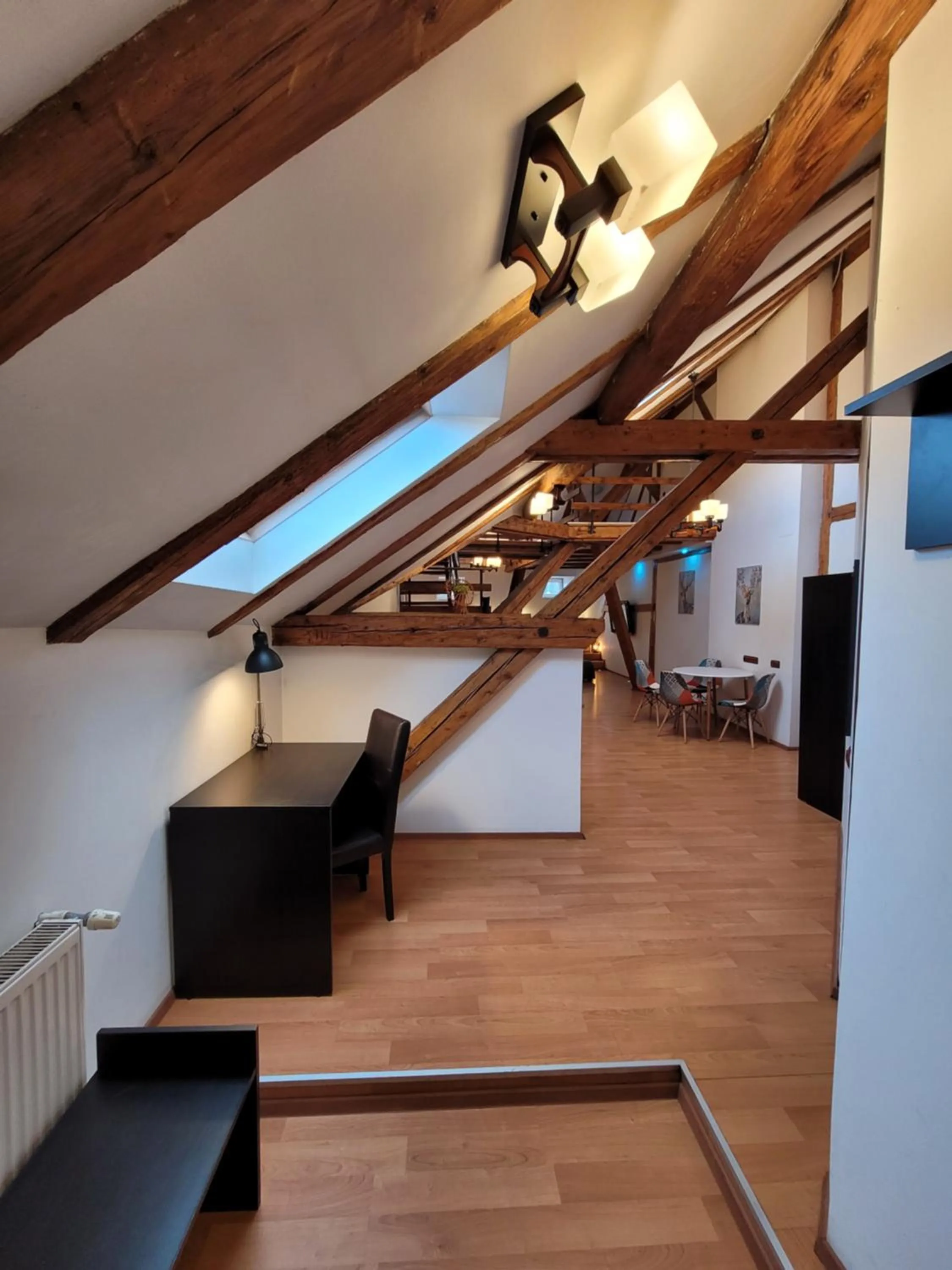 Photo of the whole room in Main Square Apartments & More