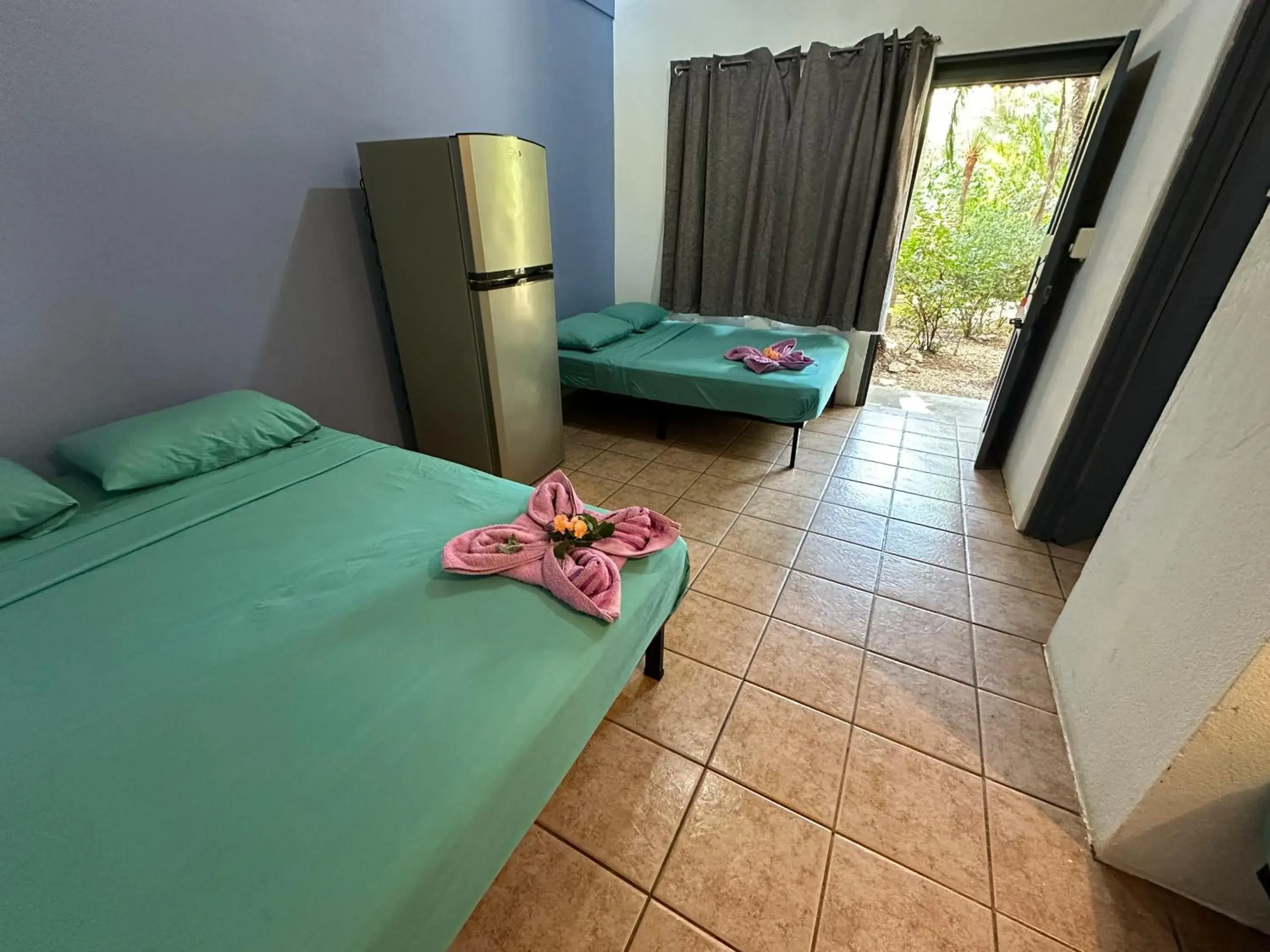 Quadruple Room with Garden View in Wide Mouth Frog Conchal Quadruple Room with Garden View in Wide Mouth Frog Conchal