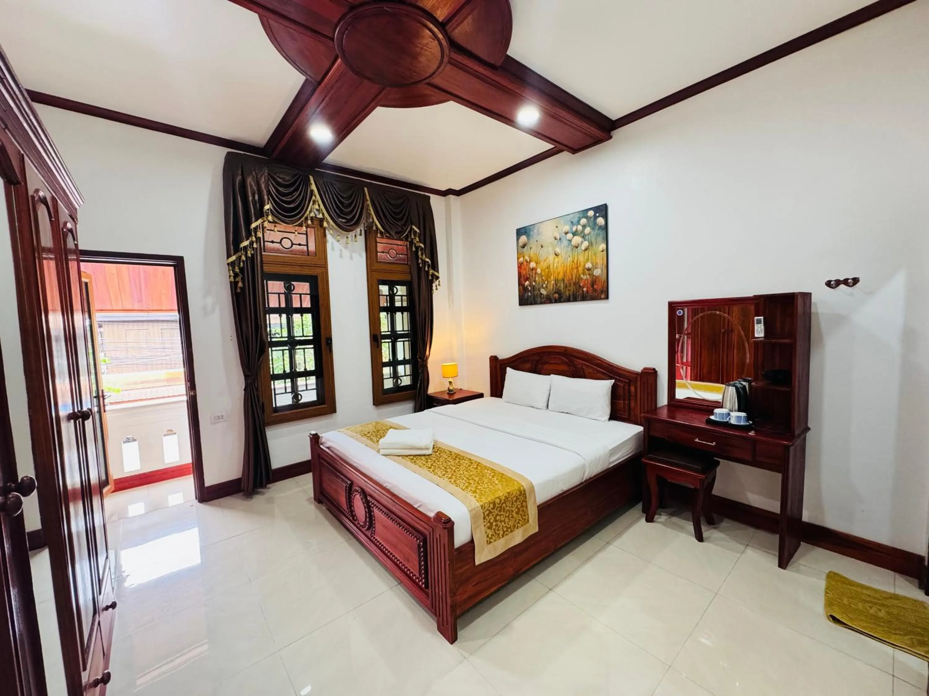 Bed in PhaiLin Hotel