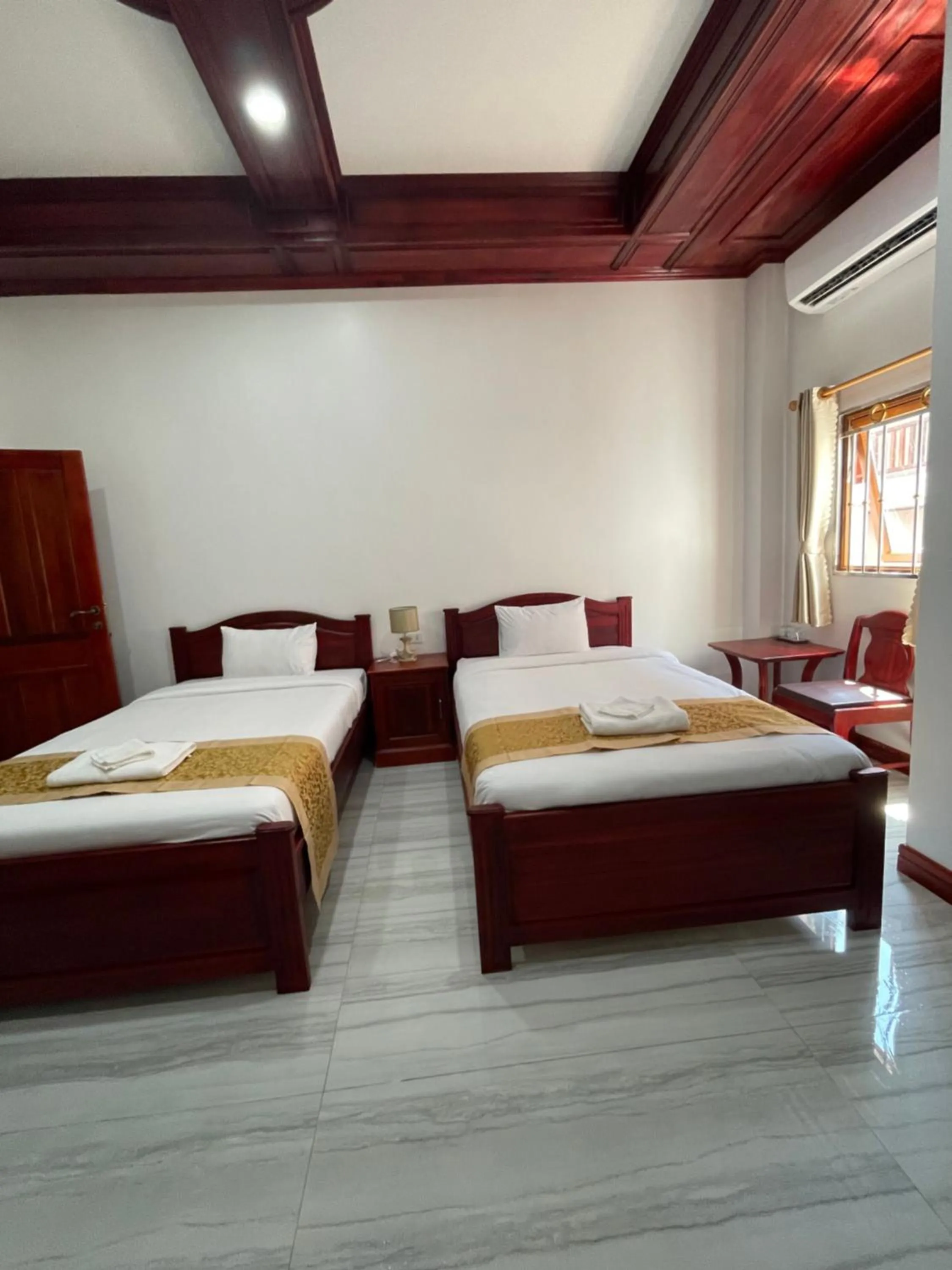 Photo of the whole room, Bed in PhaiLin Hotel