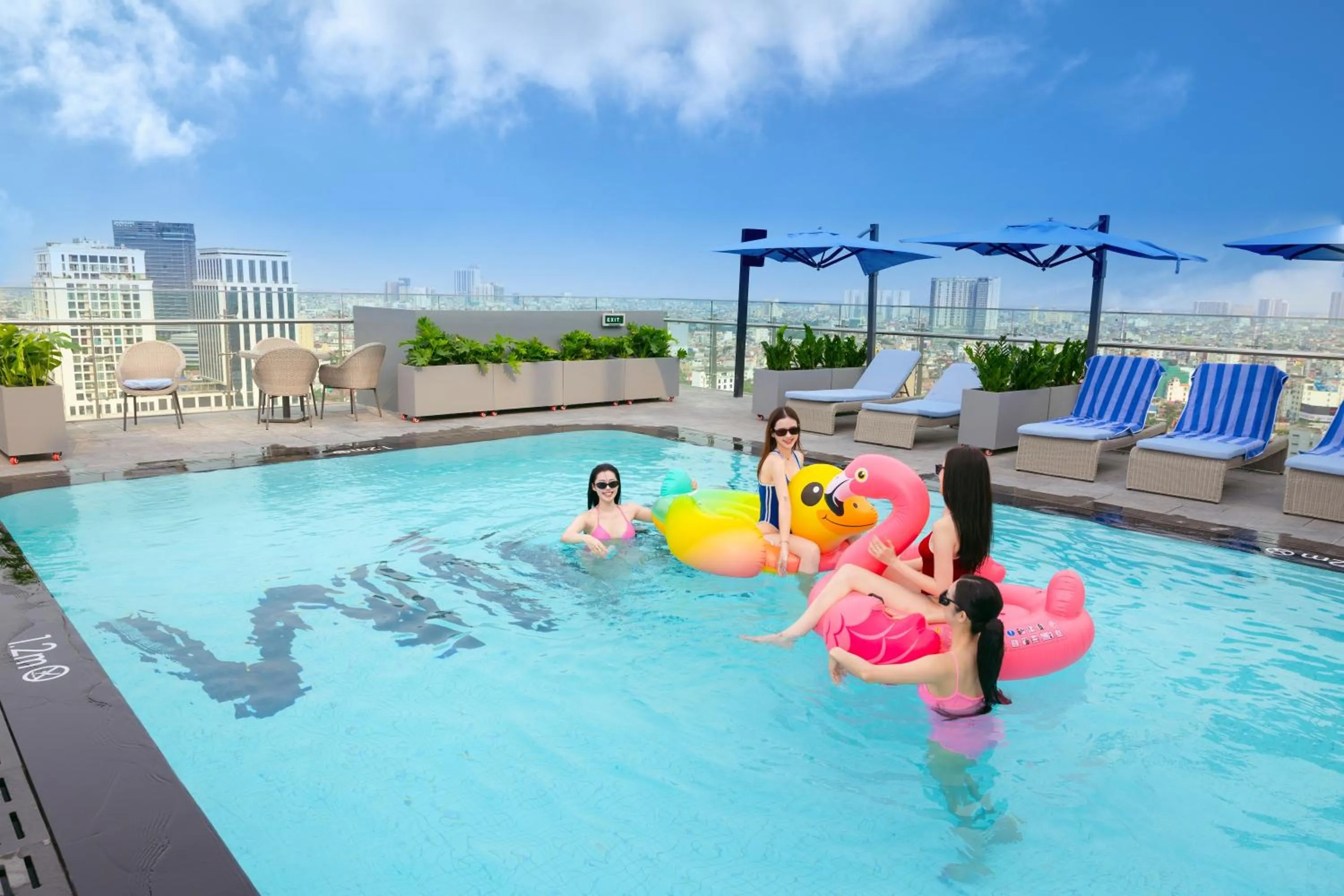 Swimming pool in Wink Hotel Can Tho Ninh Kieu Wharf - 24hrs Stay & Rooftop Pool Bar