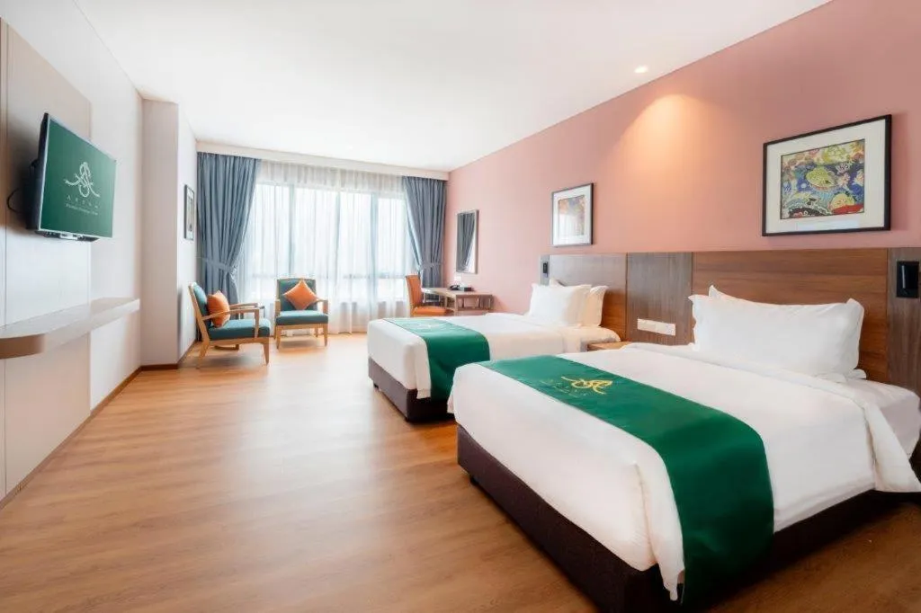 Bed in Arena Premier Hotel