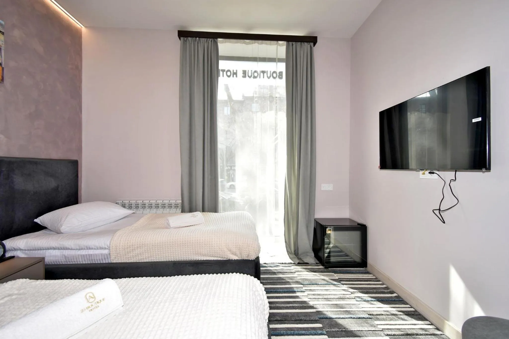 Bed in Avenue 23 Boutique Hotel