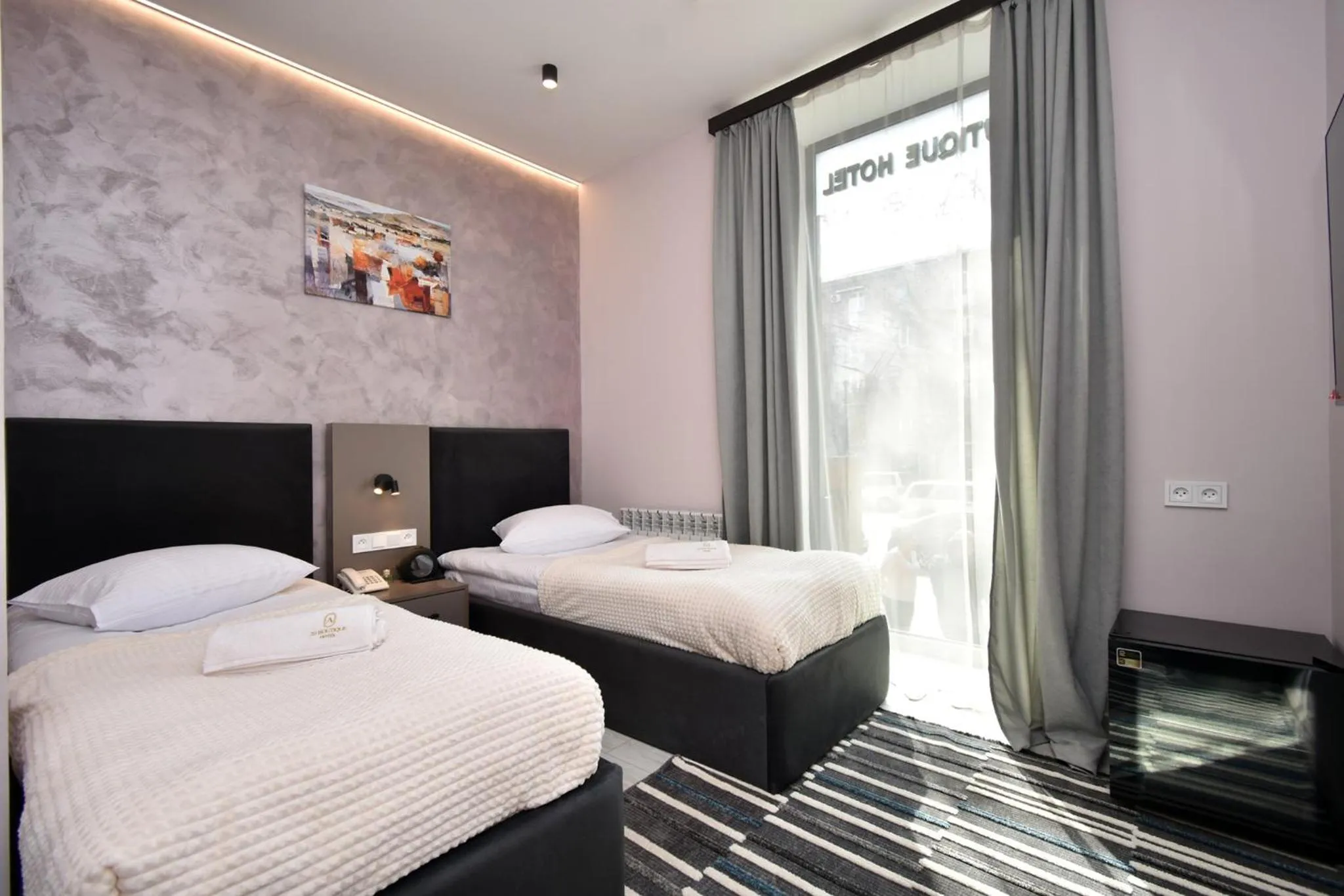 Bed in Avenue 23 Boutique Hotel