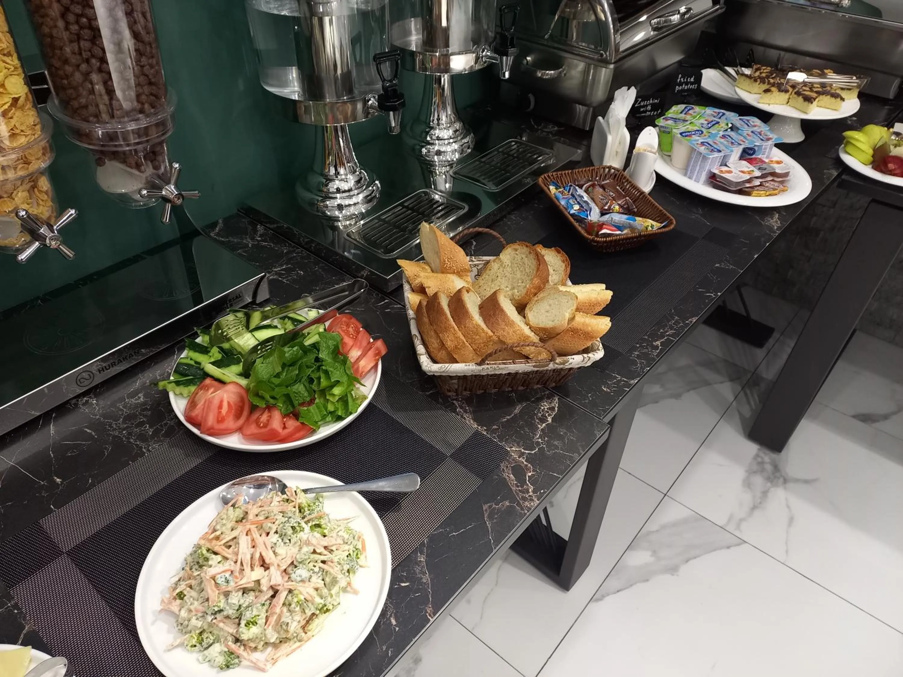 Buffet breakfast in Avenue 23 Boutique Hotel