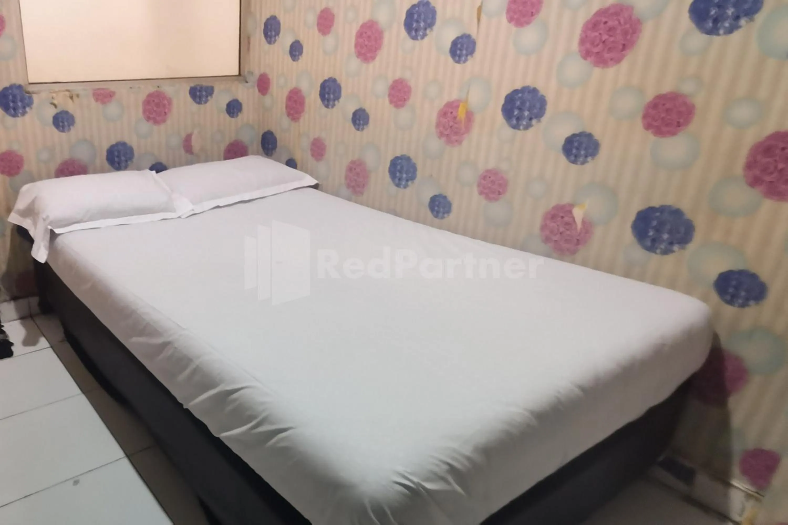 Bed in Tangki Residence 1 RedPartner