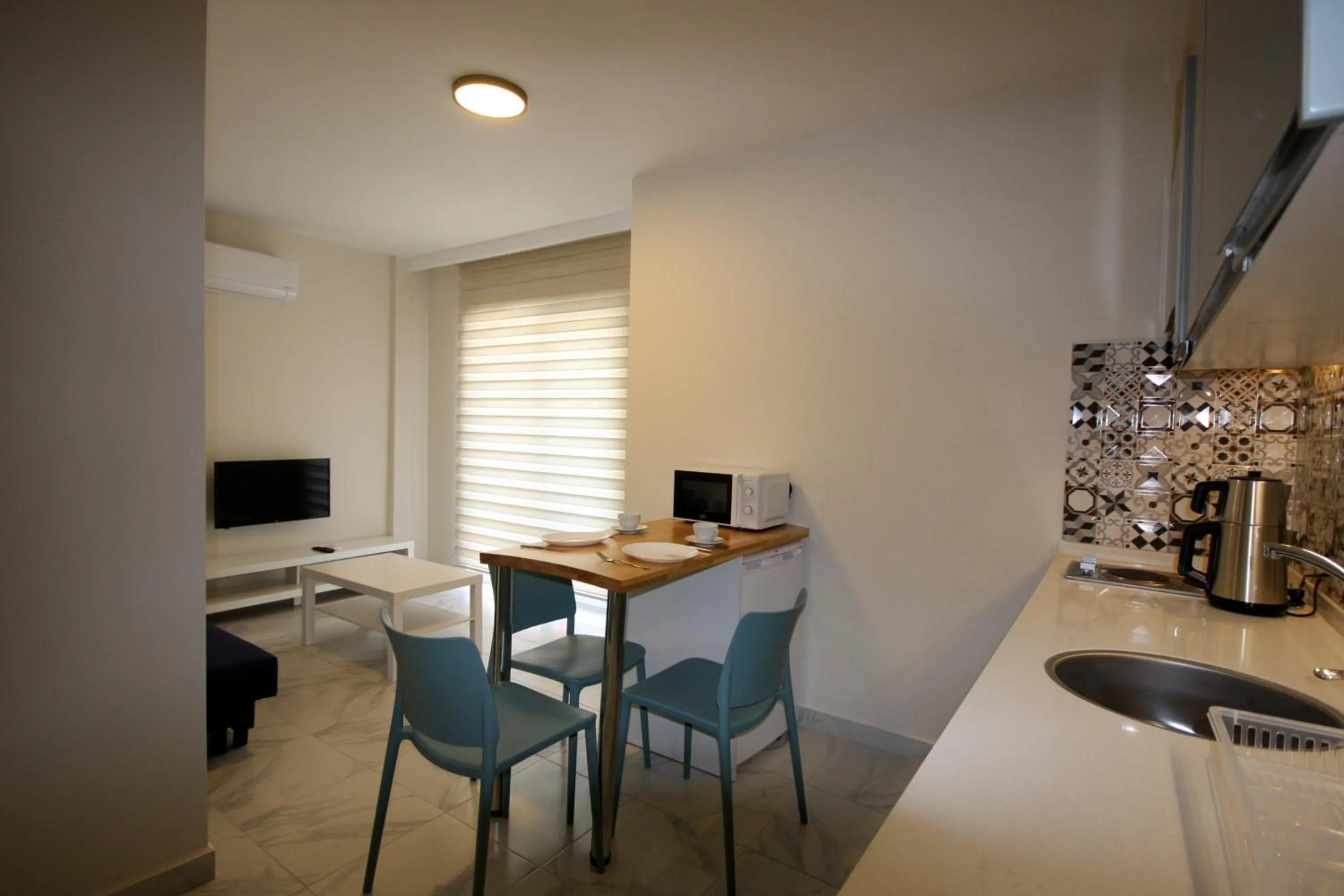 Kitchen or kitchenette in Palmea Hotel