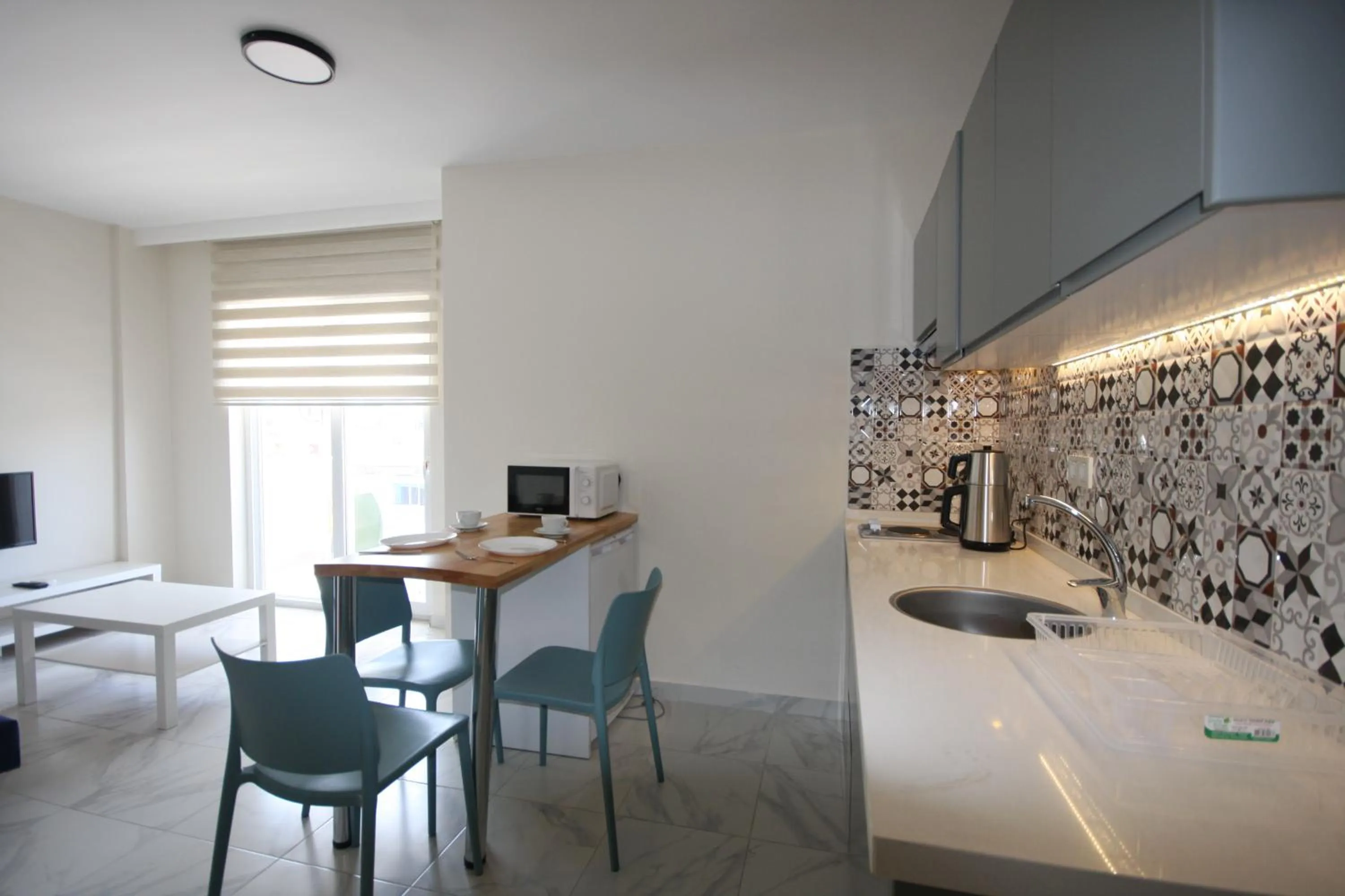 Kitchen or kitchenette in Palmea Hotel